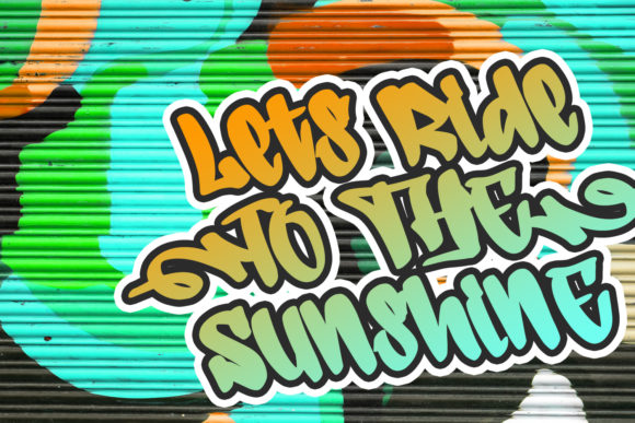 Orange and green "Lets ride to the sunshine" lettering in graffiti font on a graffiti background.