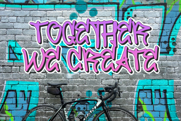 Purple "Together we create" lettering in graffiti font against a cool image.