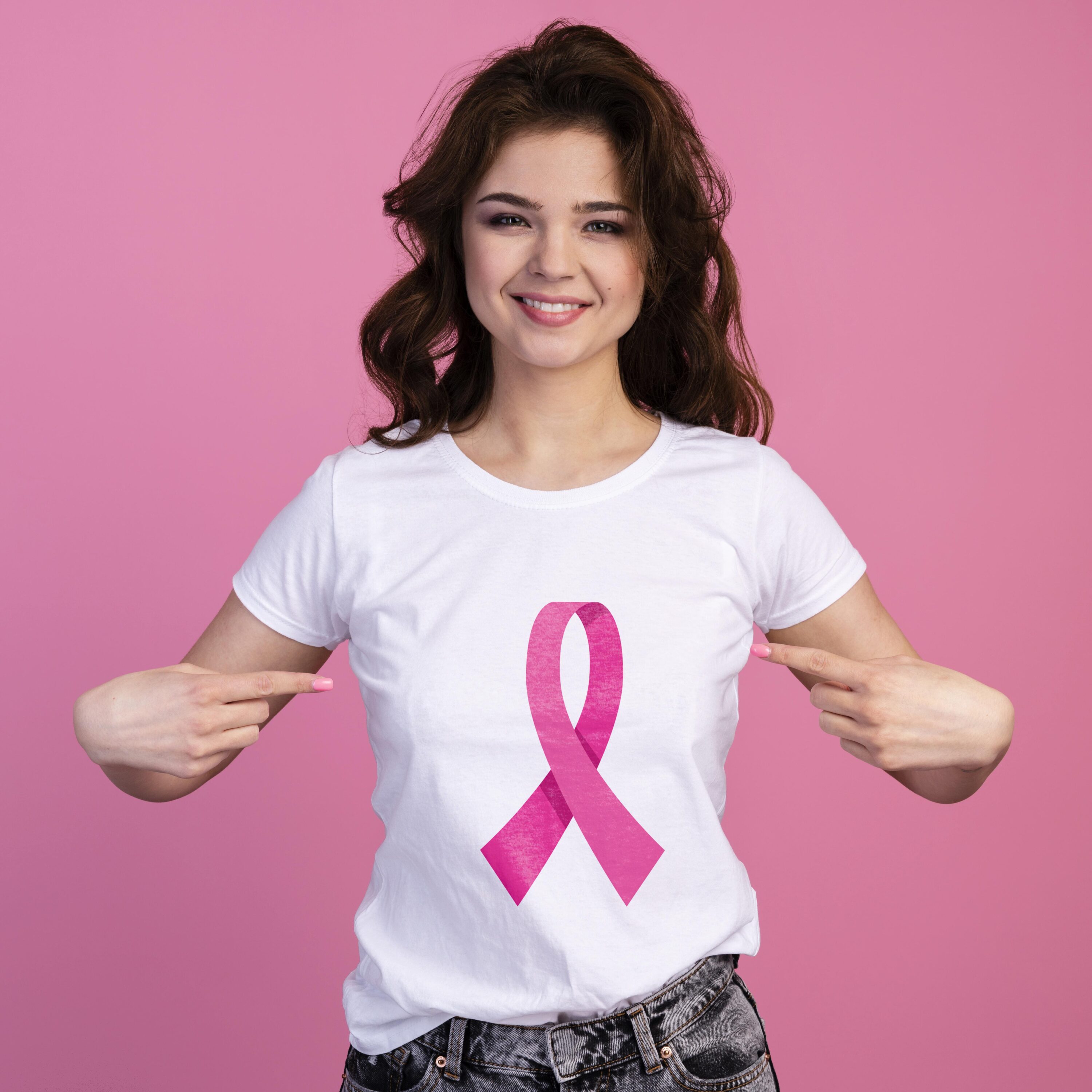 White t-shirt with the pink breast cancer ribbon on the white t-shirt.
