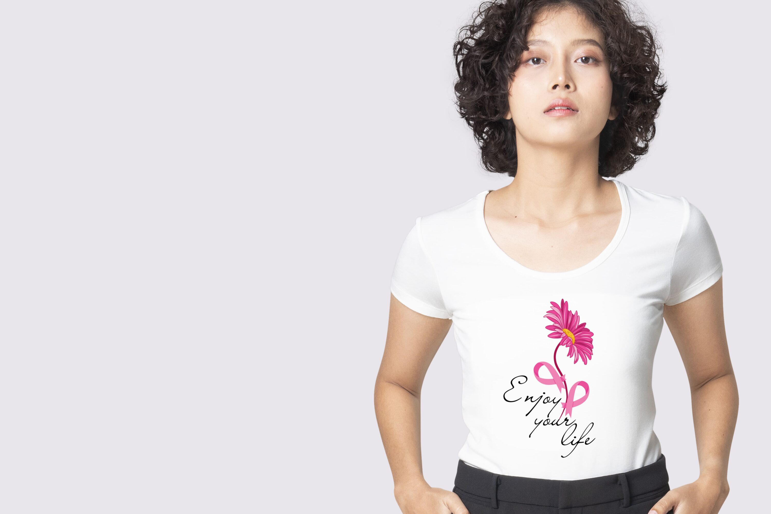 Women t-shirt with the pink flower and breast cancer ribbon.