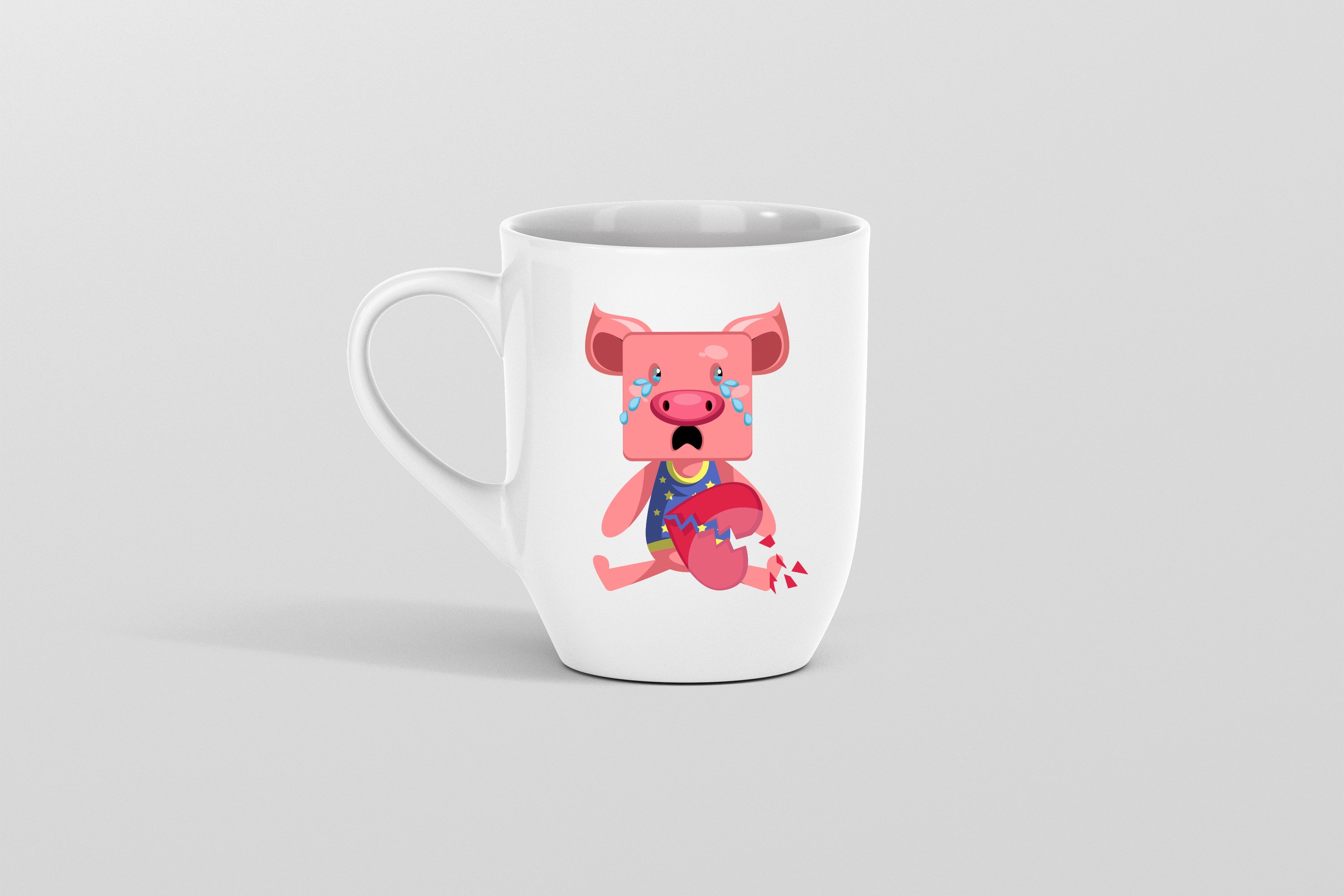 White cup with the pink pig.