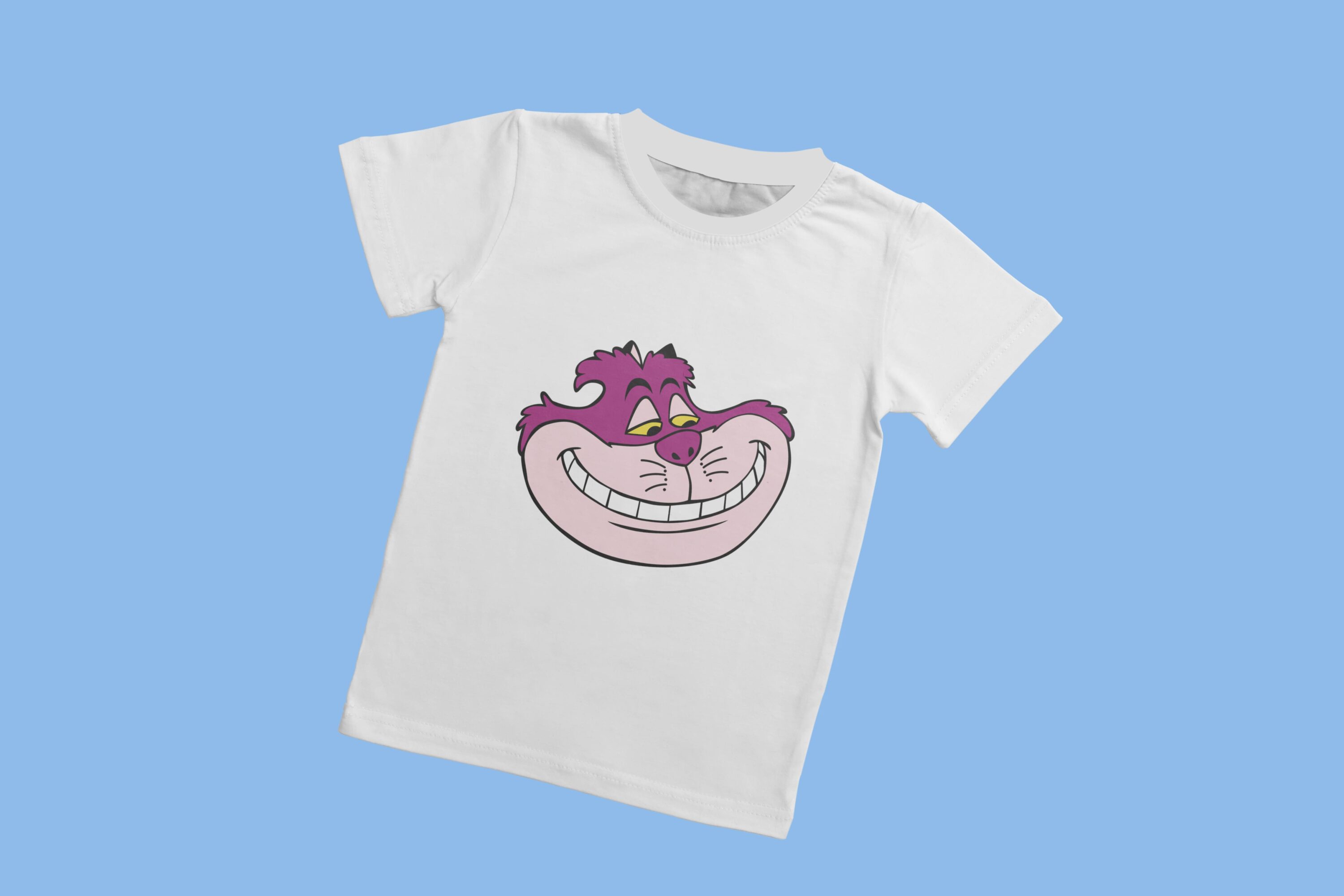A white t-shirt with a white collar and the face of a smiling Cheshire cat on a blue background.