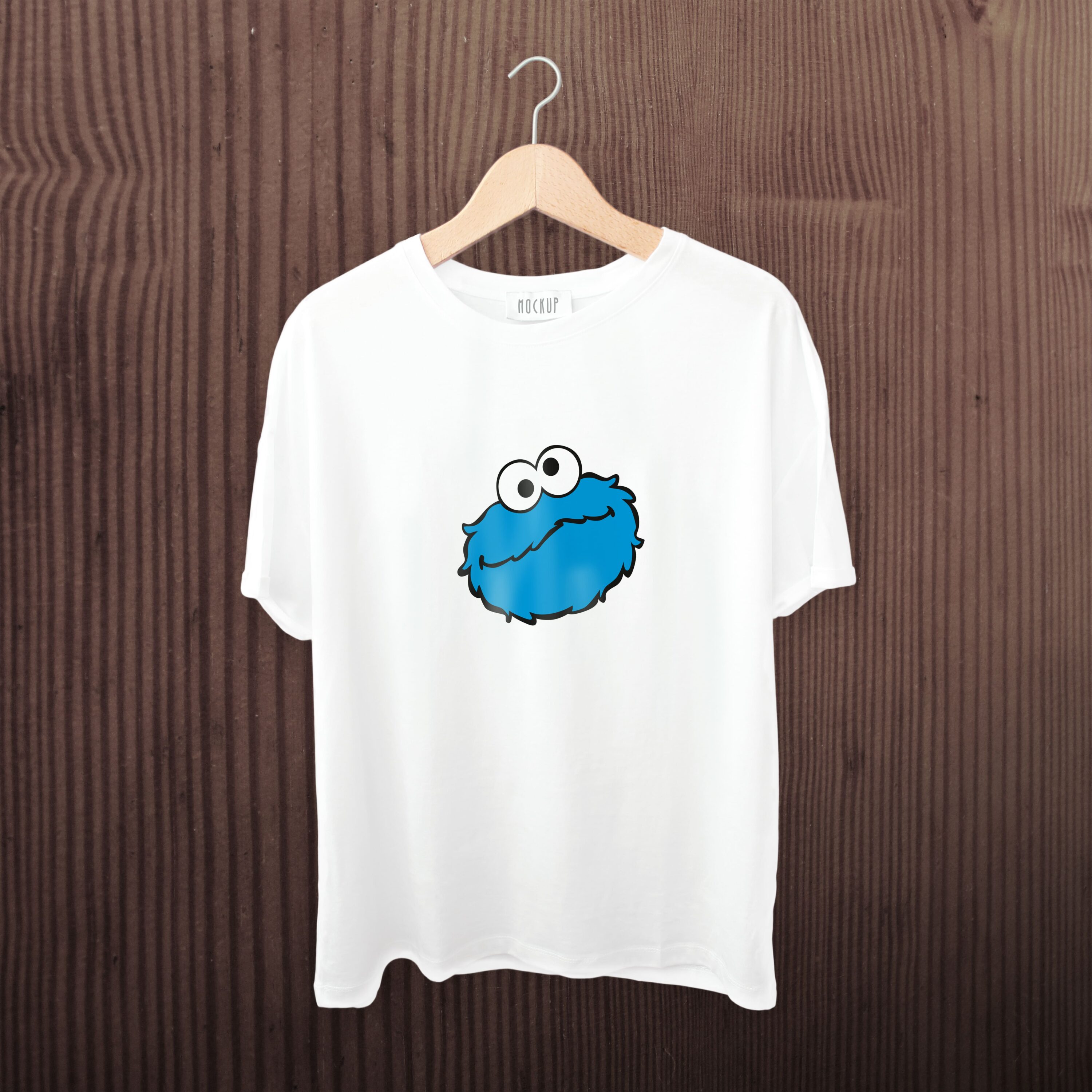 A white t-shirt with a alarmed cookie monster face.