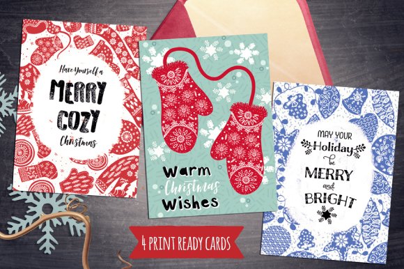 A set of 3 different holiday cards in white, red and blue.