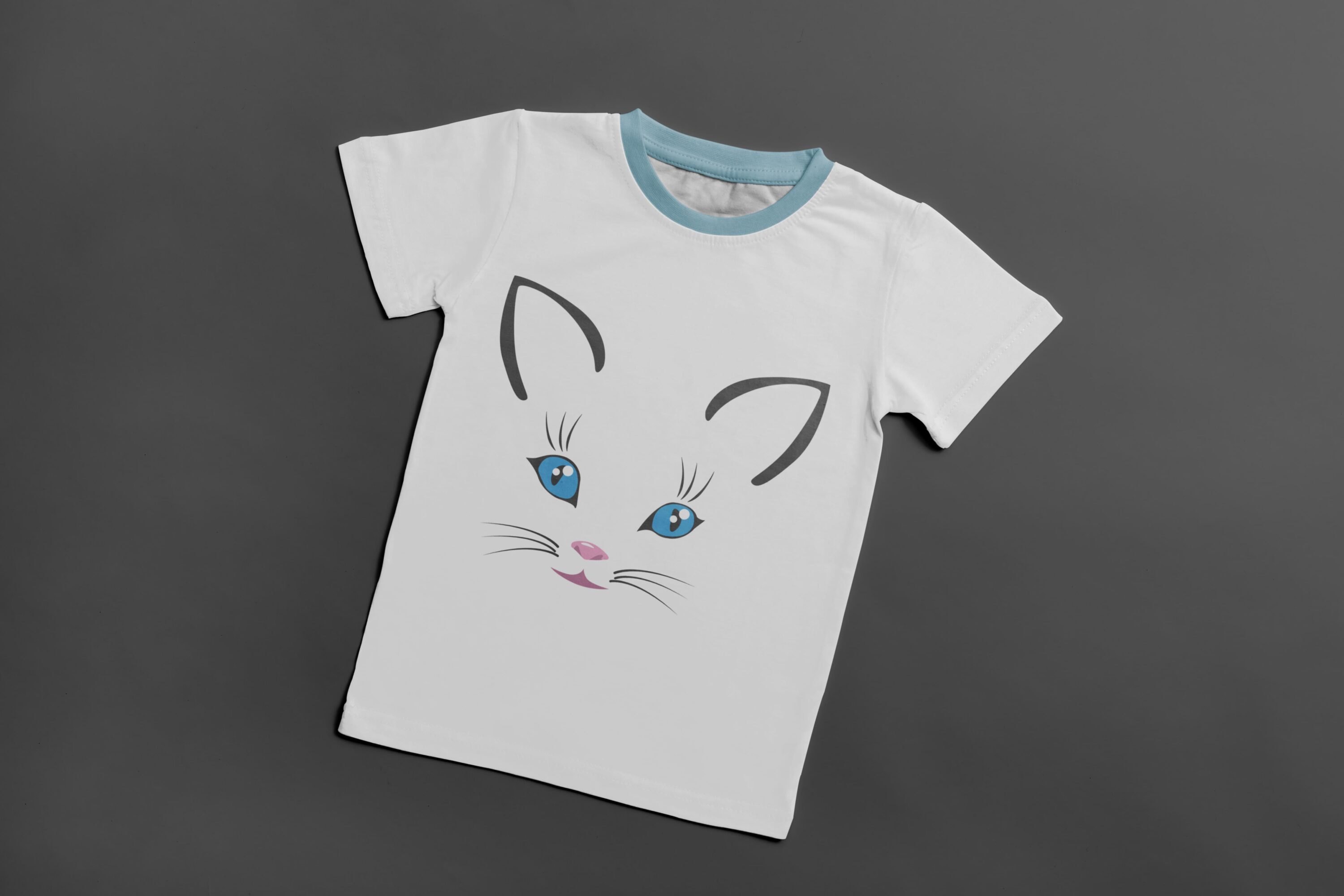 A white t-shirt with a light blue collar and the face of a cute cat with blue eyes.