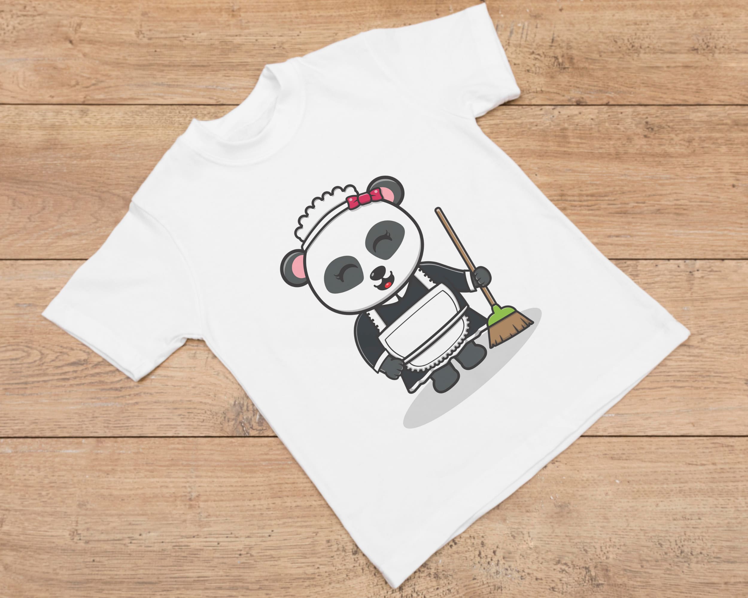 White t-shirt with laughing cleaning lady panda with a broom on a wooden background.
