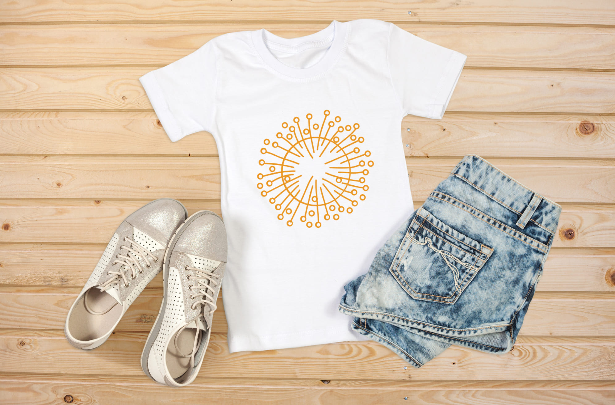 T-shirt image with irresistible orange dandelion print.