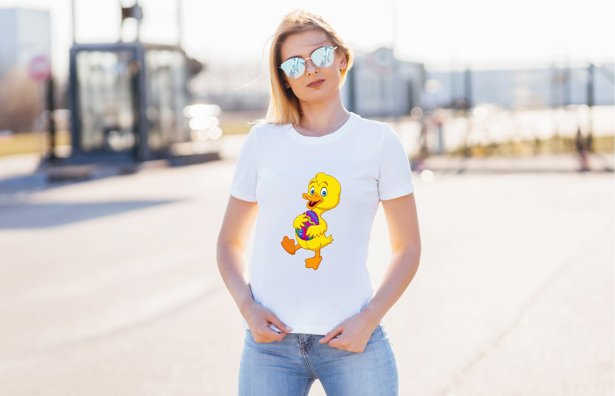 Picture of a white t-shirt with a wonderful print of an easter egg and a duck.