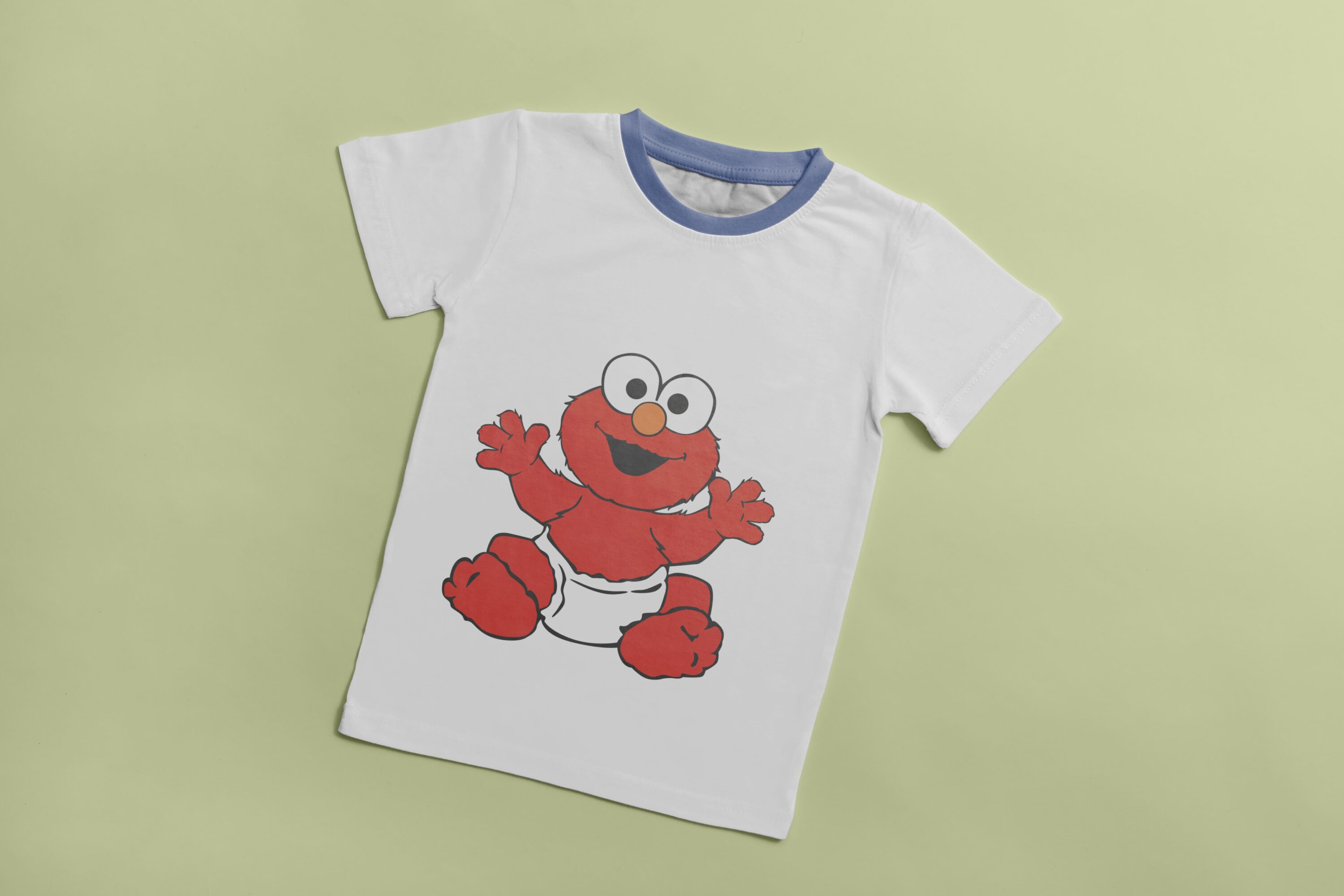 White T-shirt with a blue collar and an image of a red baby Cookie Monster.