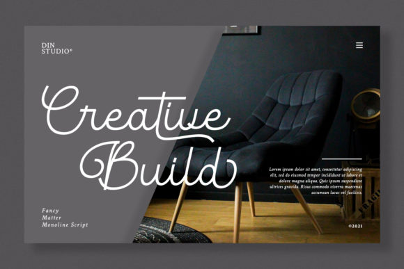 White lettering "Creative Build" in script font on a gray background with a black chair.