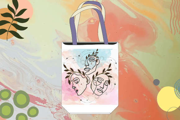 White shopping bag with women faces in line art style on a pink and blue watercolor background.