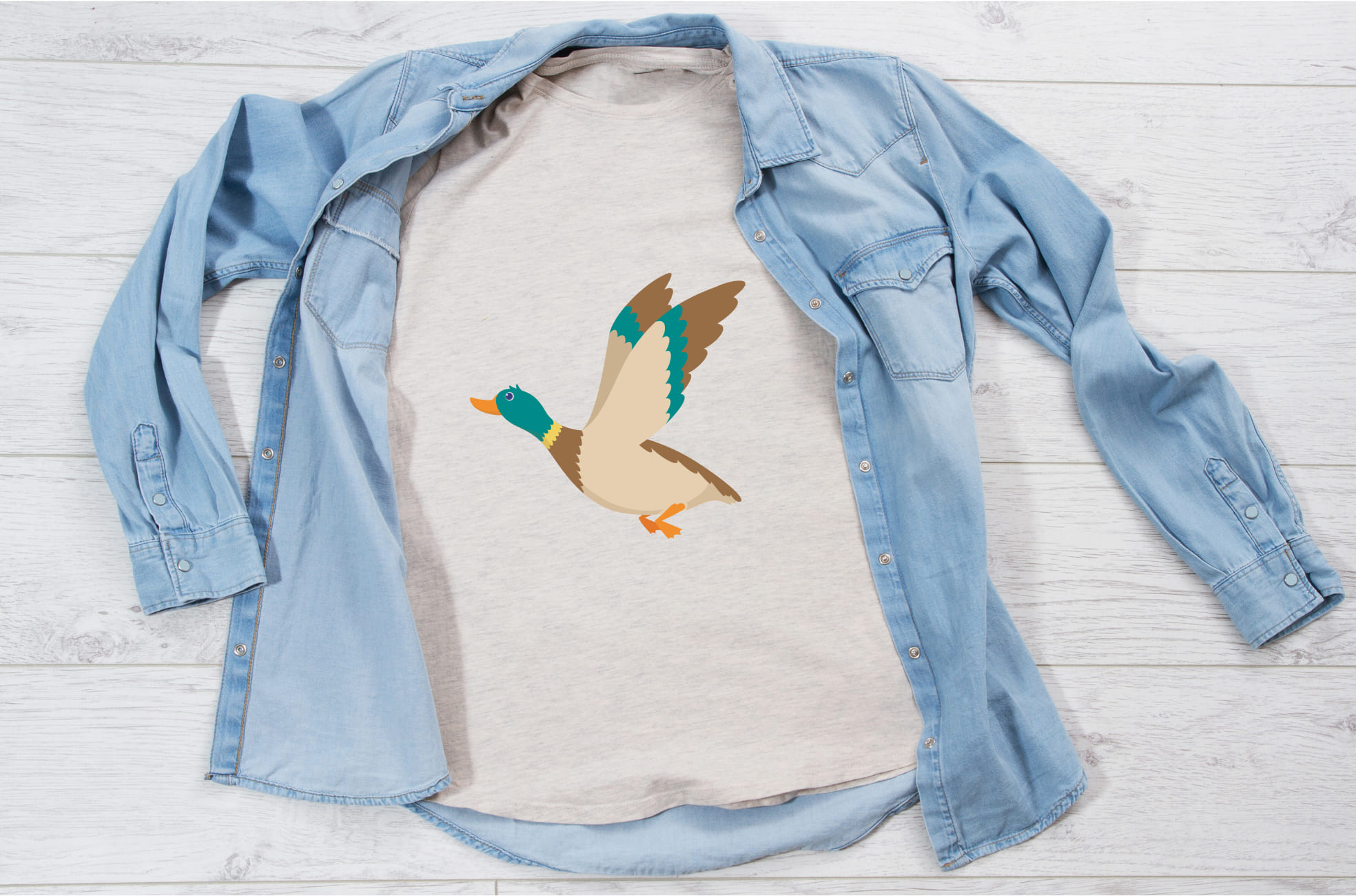 Image of a white t-shirt with an irresistible flying duck print.