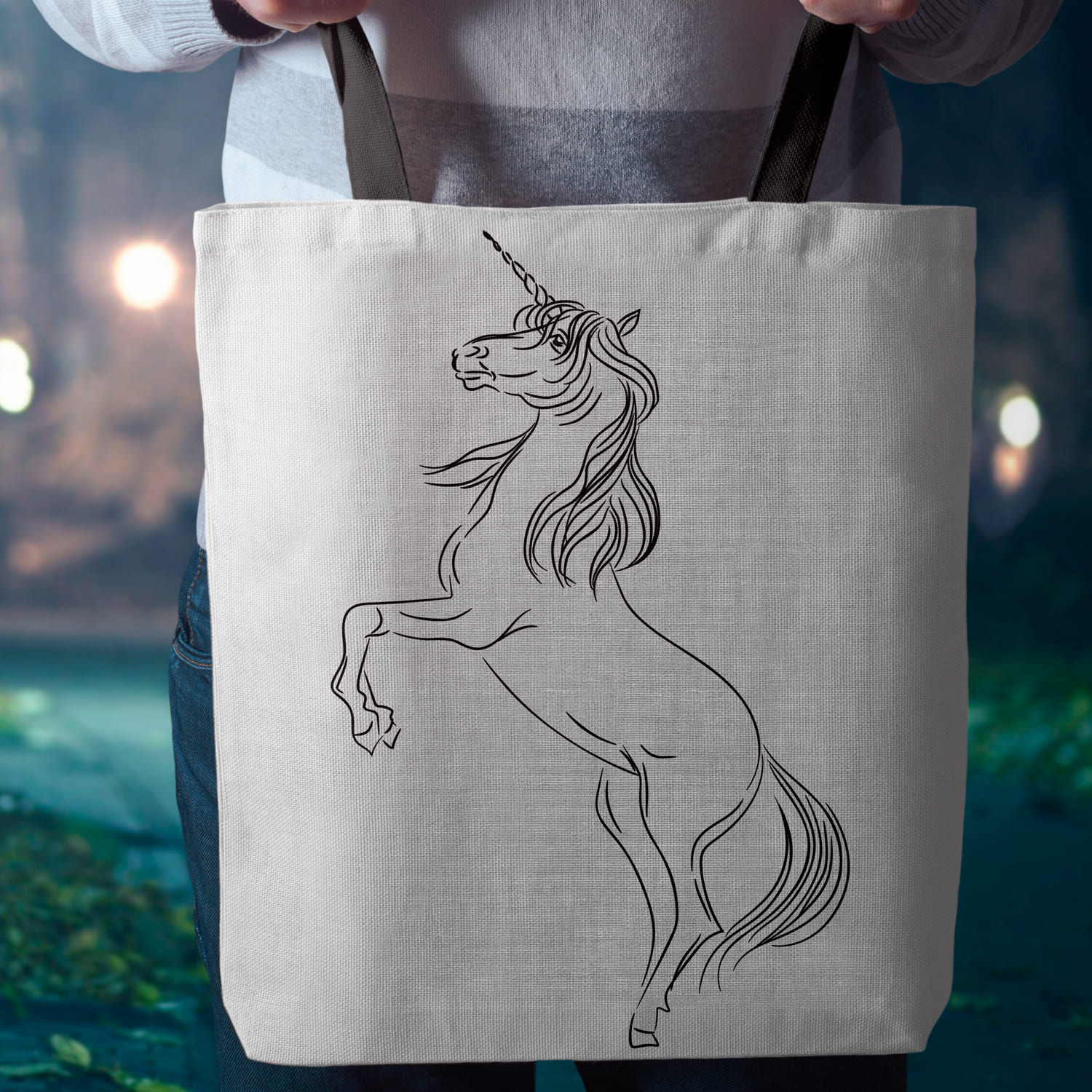 Shopping bag with printed unicorn in minimalistic style.