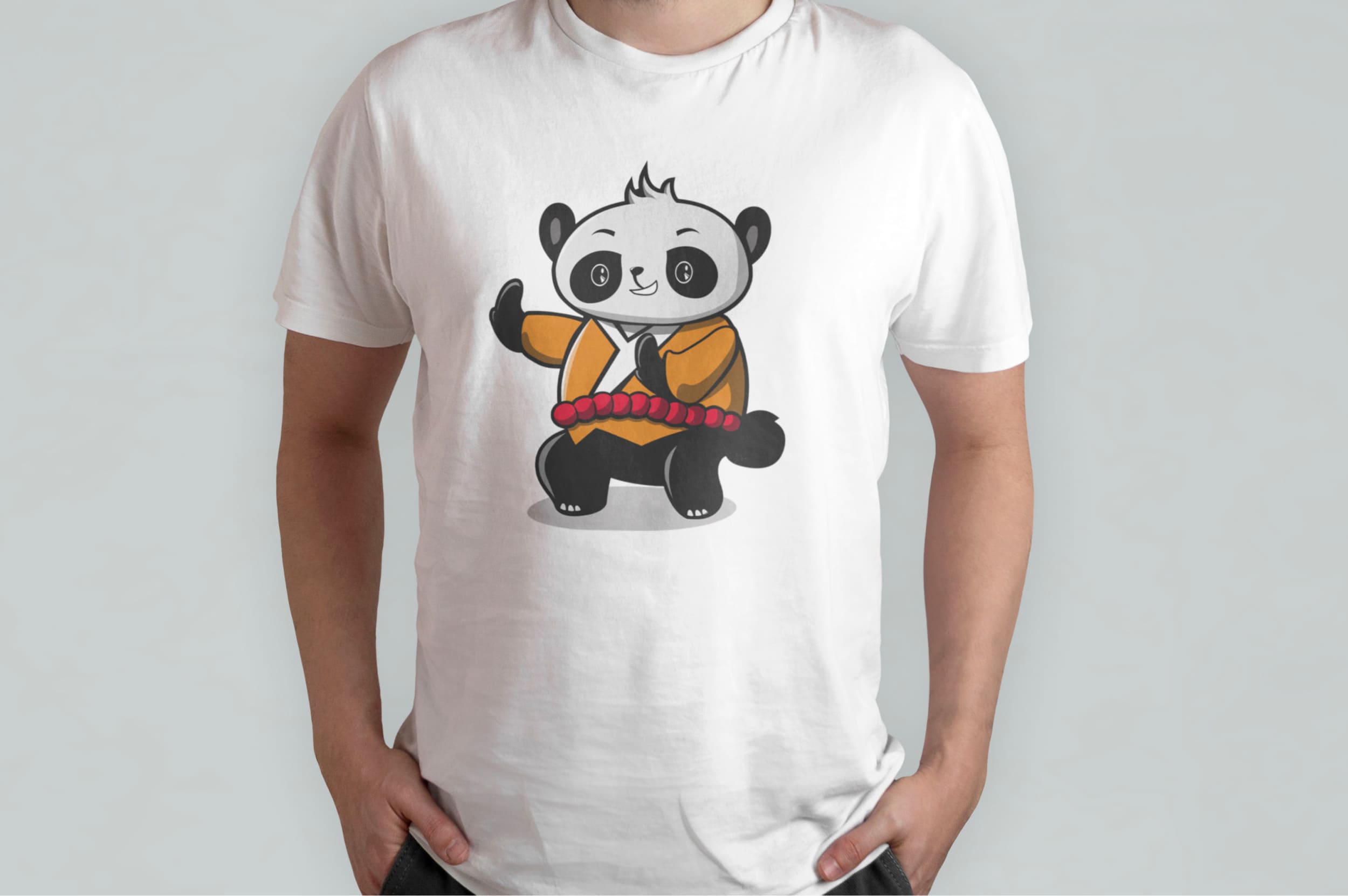 White t-shirt with kung fu panda on a man on a gray background.