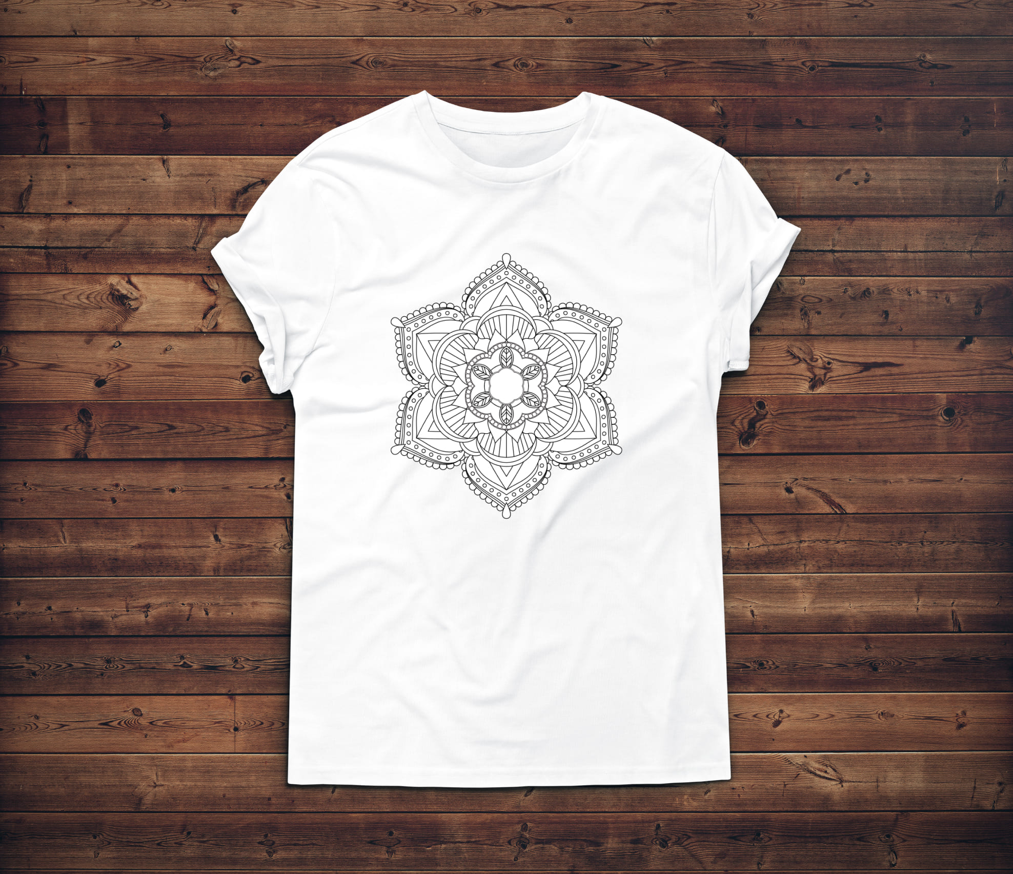 Minimalistic mandala on the white t-shirt.