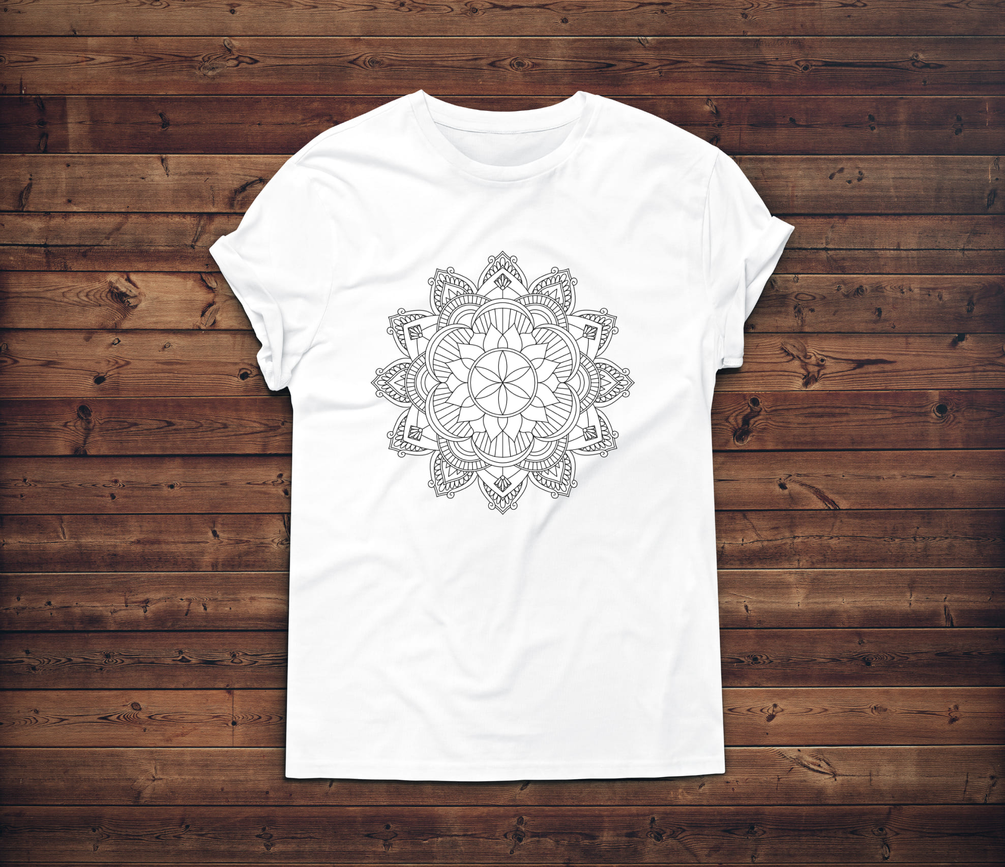Beautiful blossom mandala on the white t-shirt.