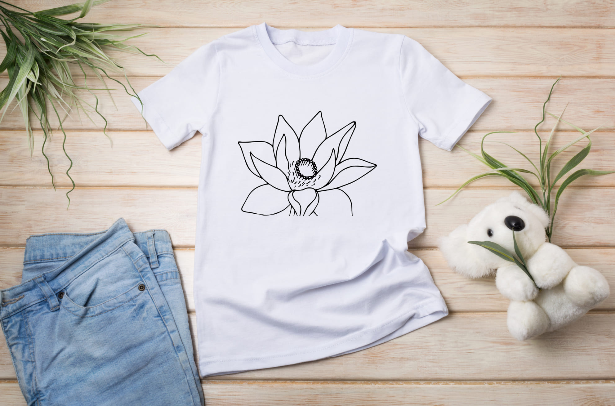 Delicate lotus flower on the white t-shirt.