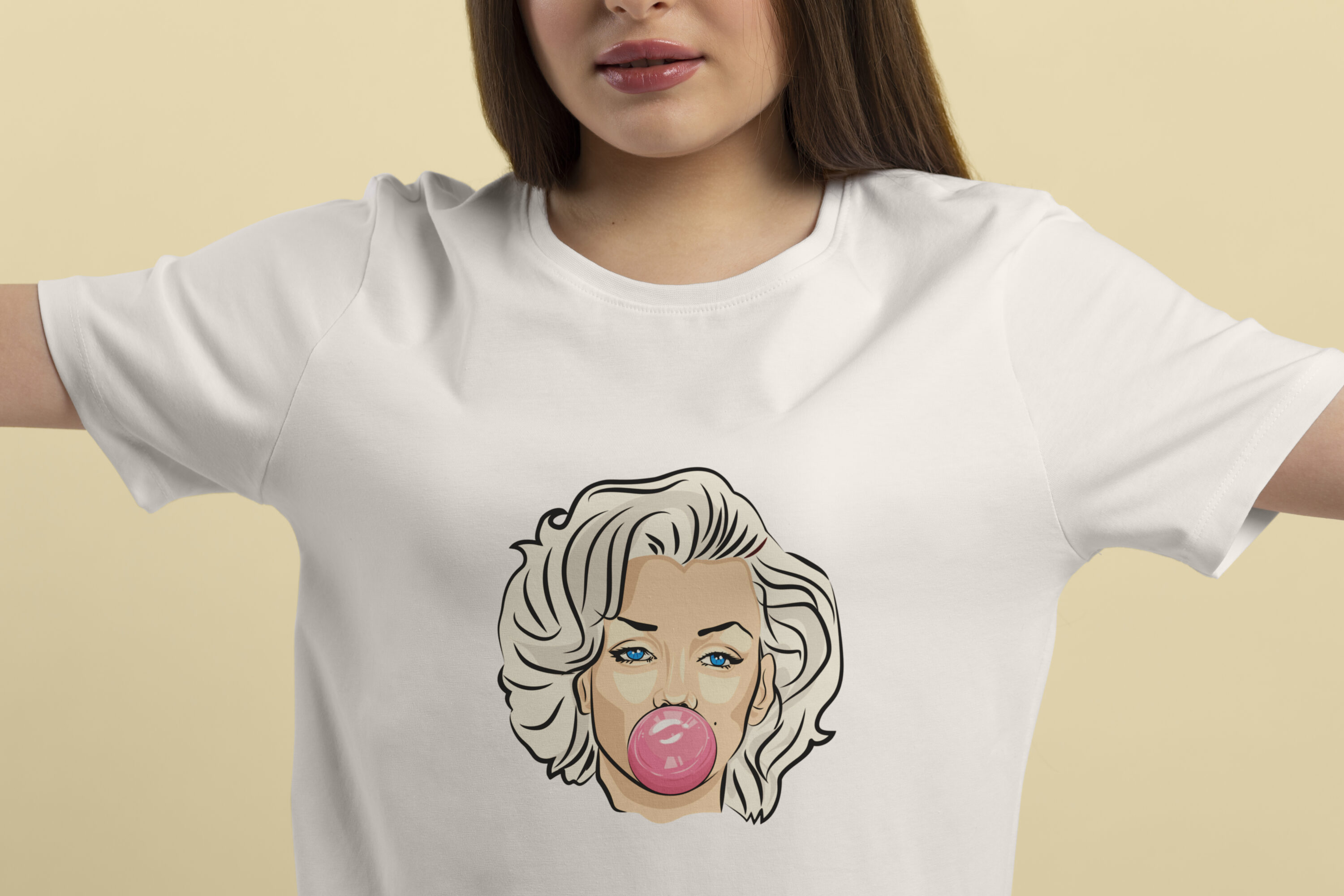 Image of white t-shirts with colorful print of Marilyn Monroe with bubble gum.