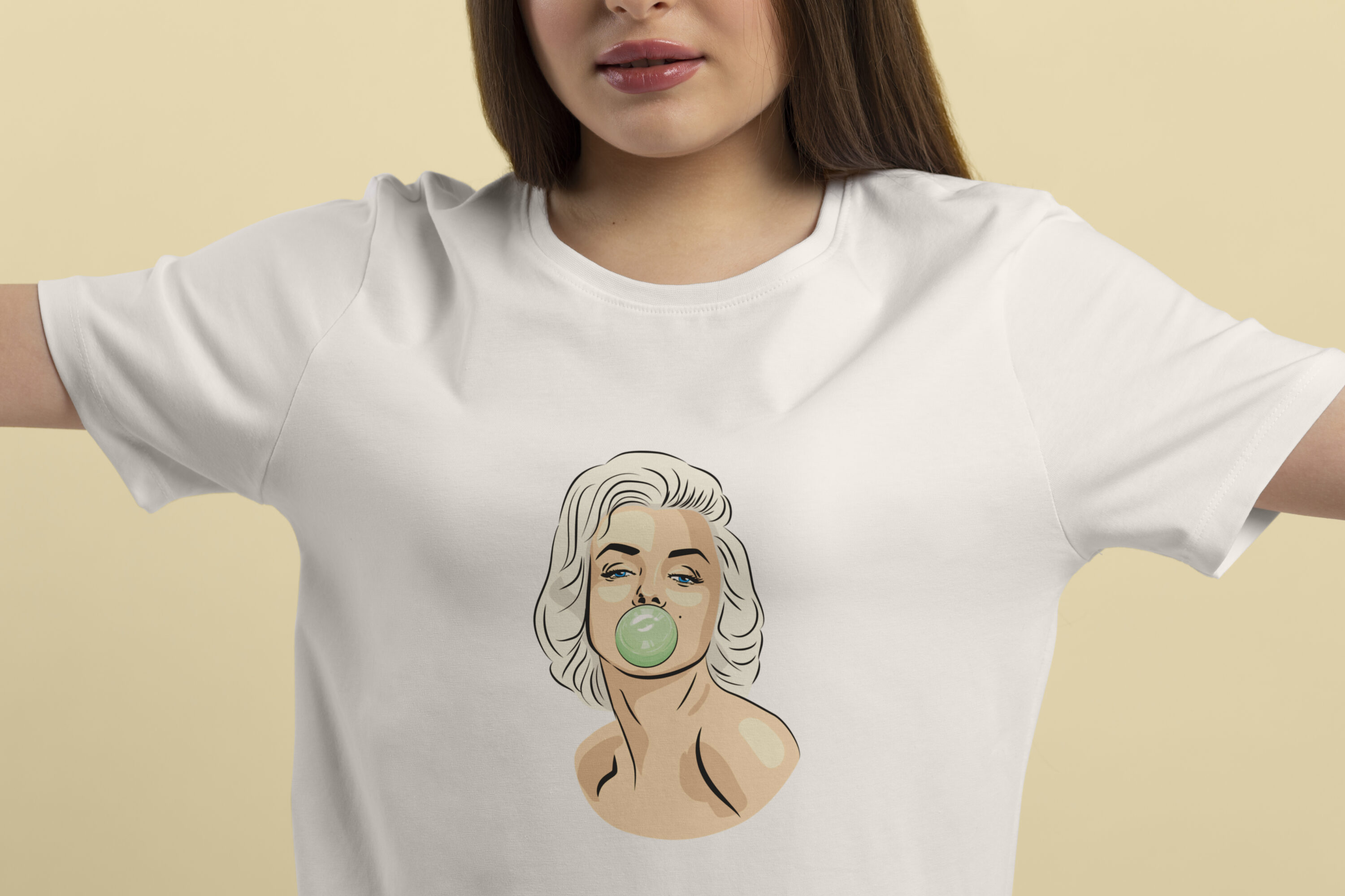 Image of white t-shirts with irresistible print of Marilyn Monroe with bubble gum.