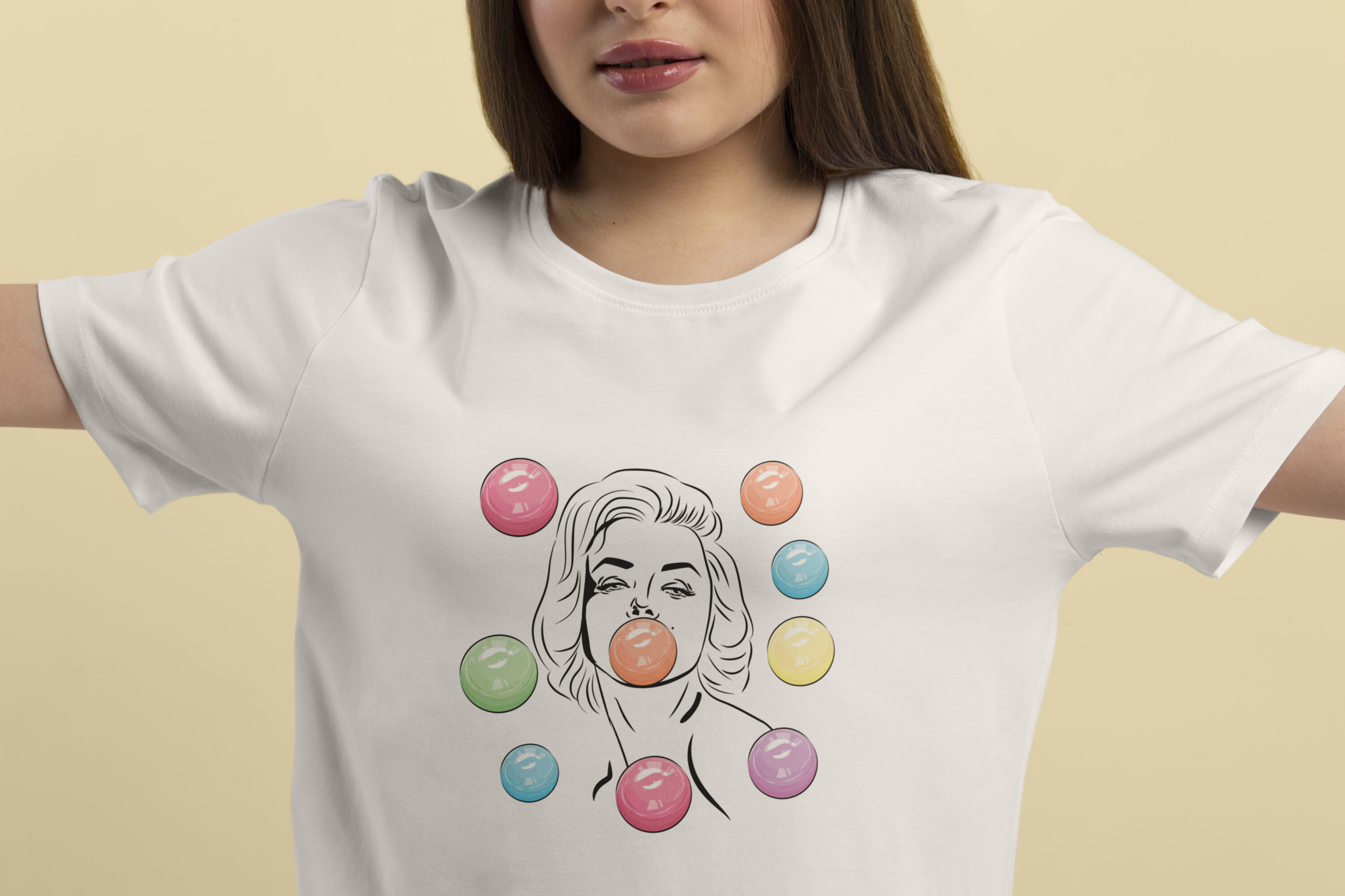 Image of white t-shirts with amazing print of Marilyn Monroe with bubble gum.