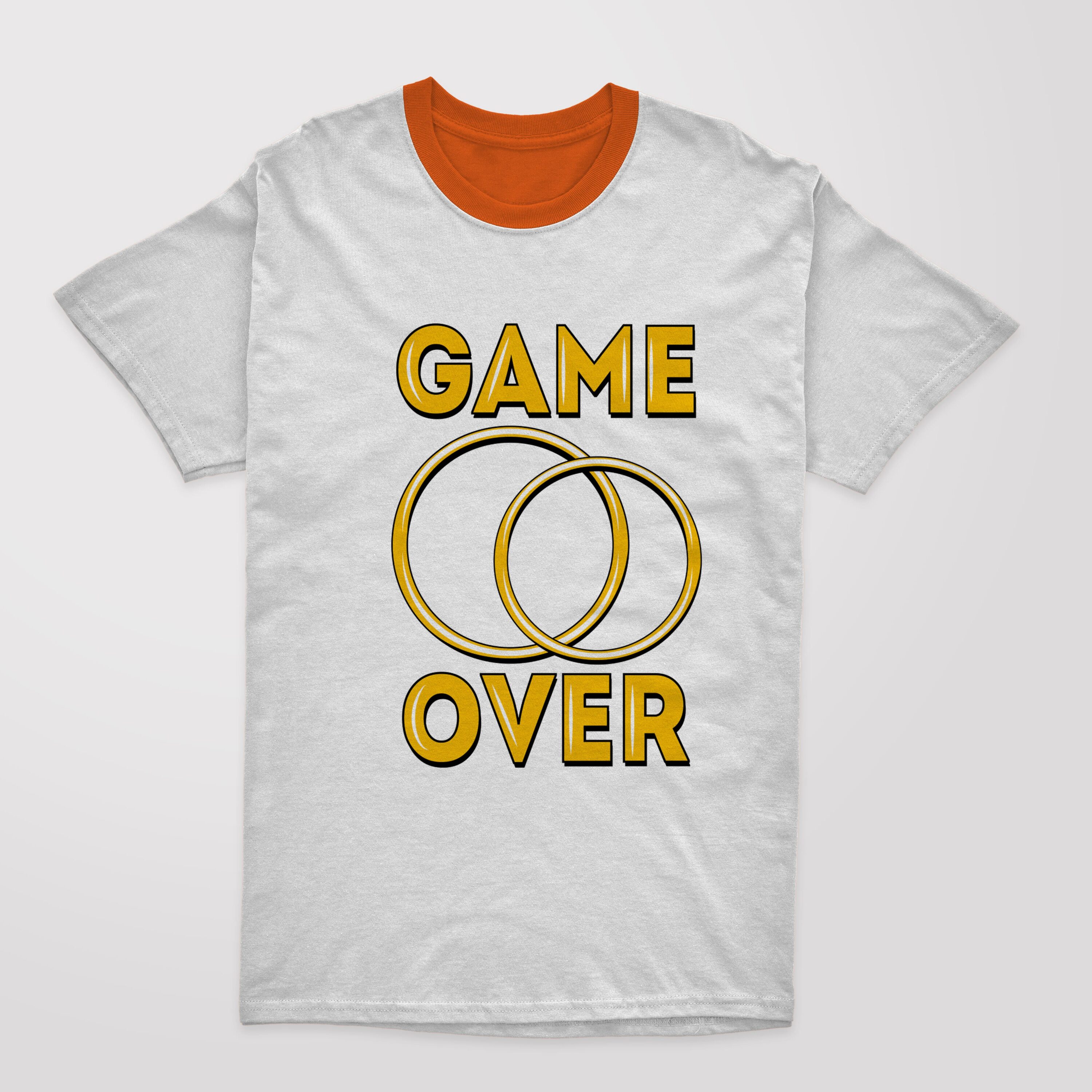 Image of a t-shirt with a beautiful print of wedding rings and the inscription "Game over".