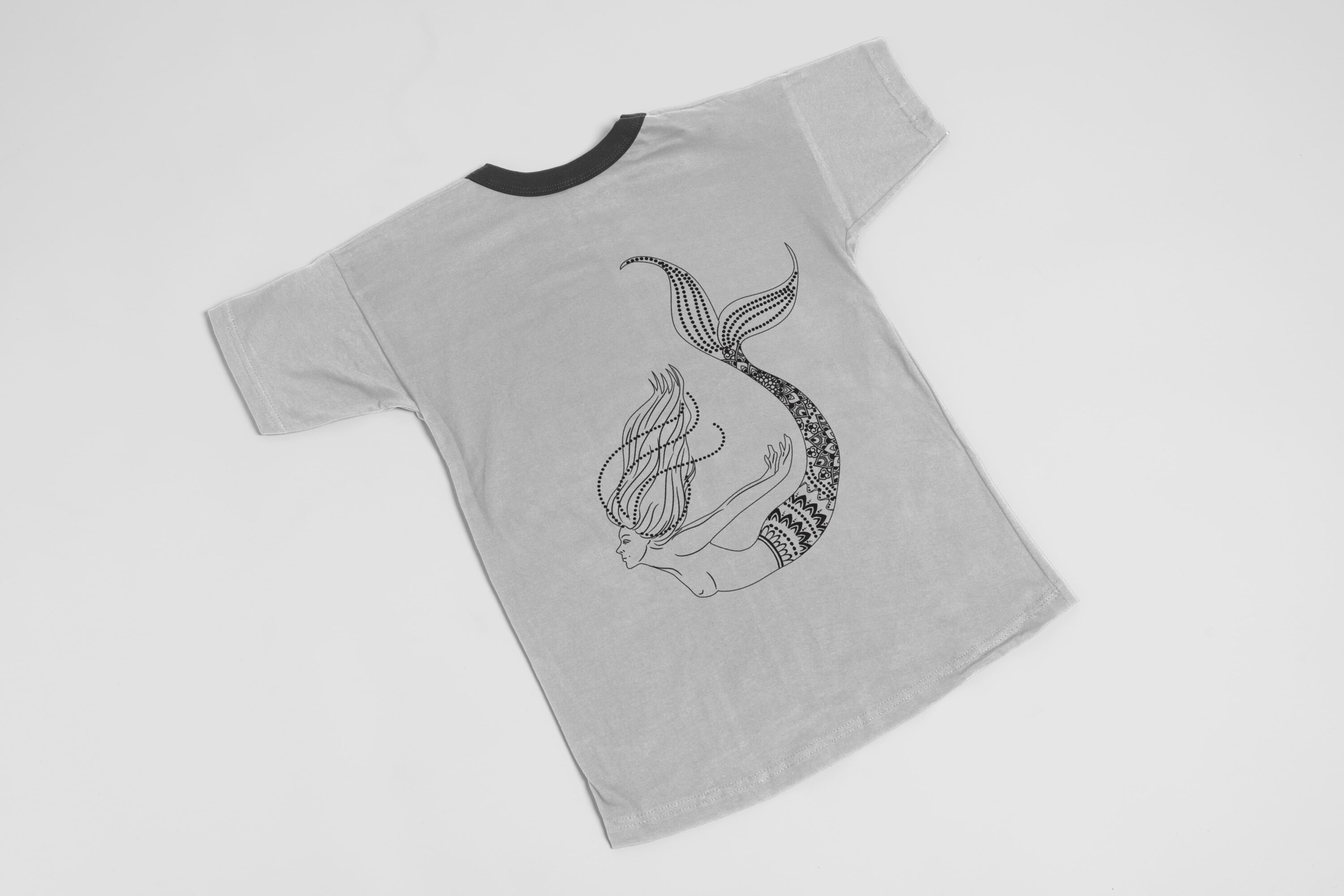 White t-shirt with the delicate outline mermaid.