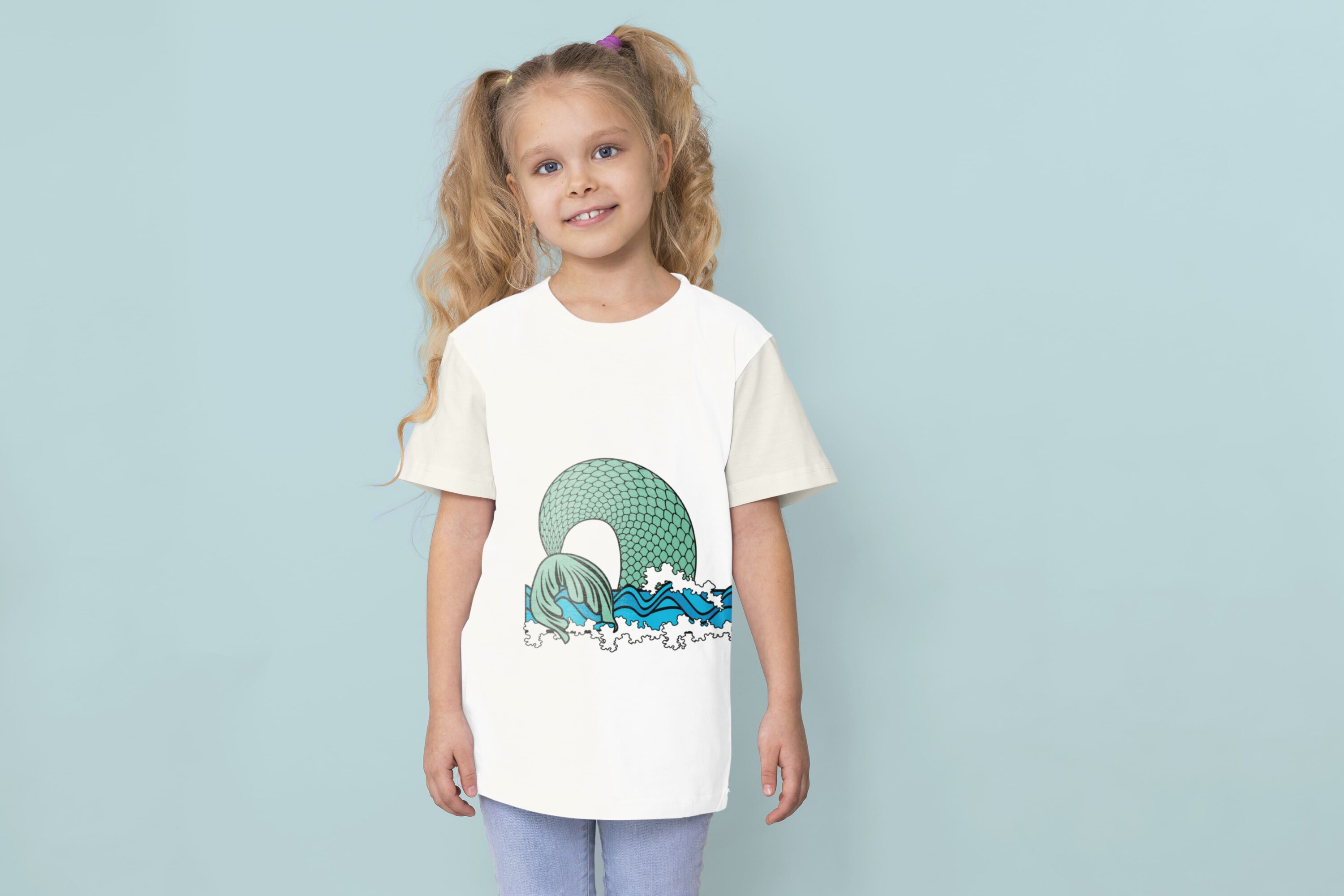 White t-shirt with the green mermaid tail.
