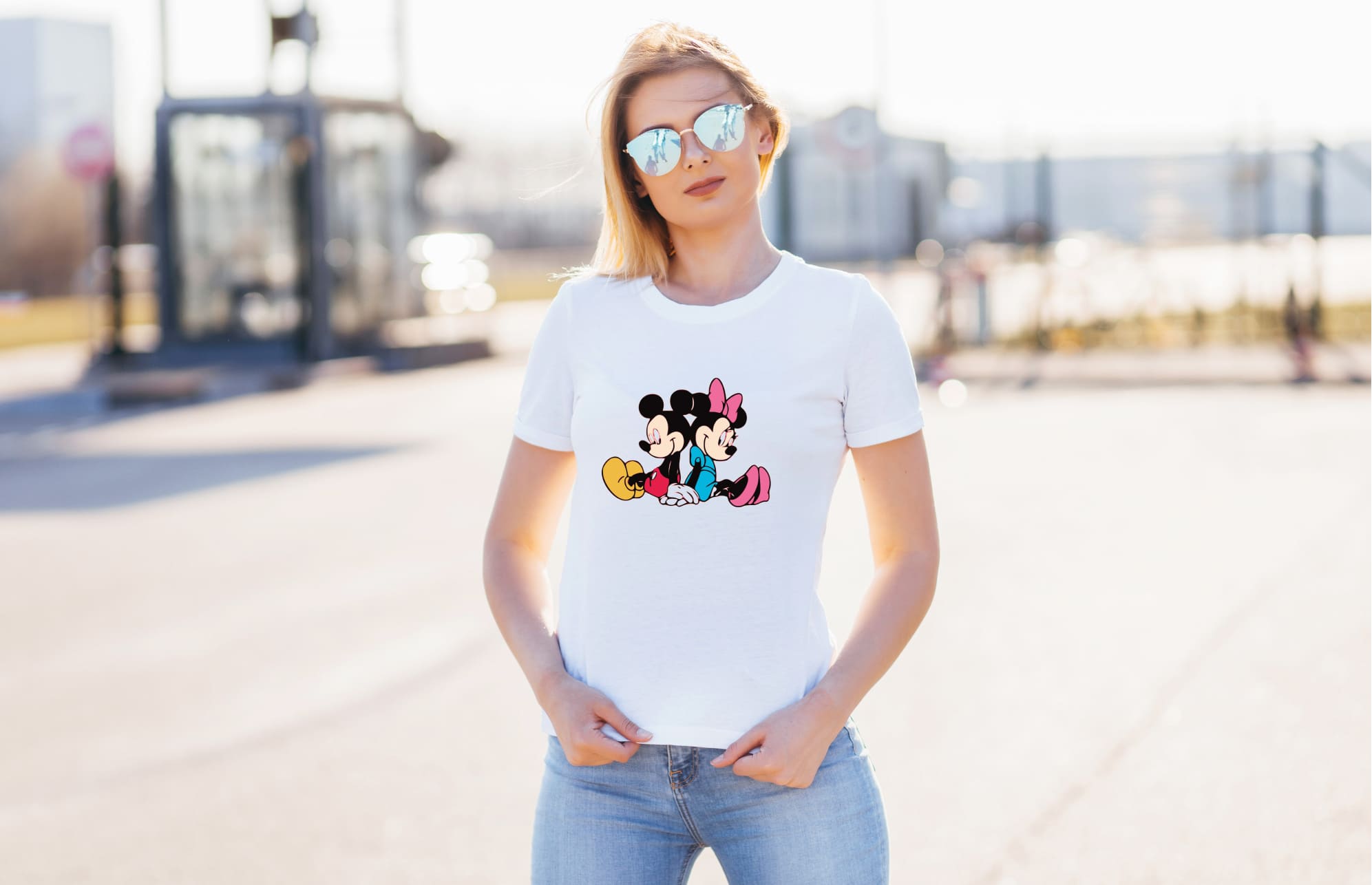 Two mickey mouses on the simple white t-shirt.