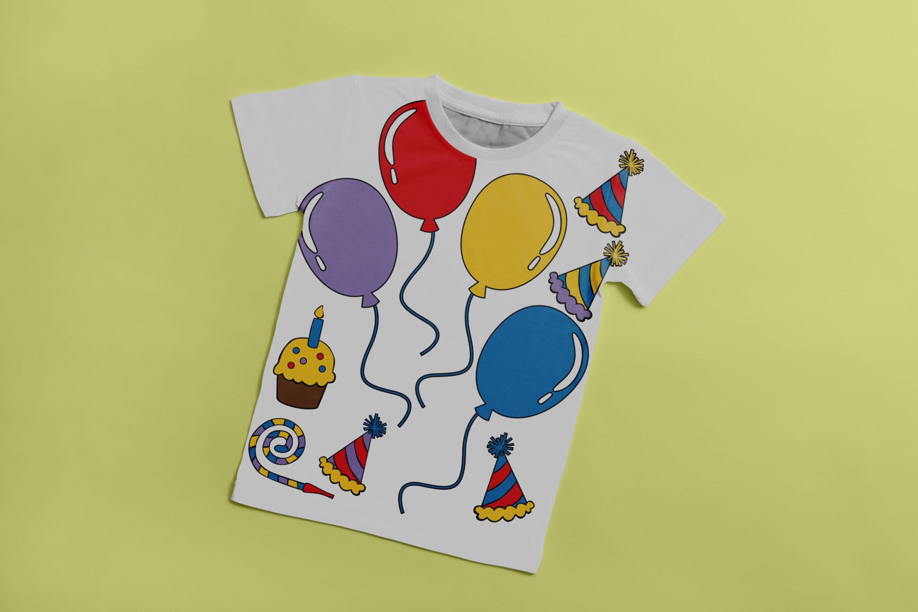 White T-shirt with lavender, red, yellow and blue balloons, 4 party hats, party cake and birthday whistle.
