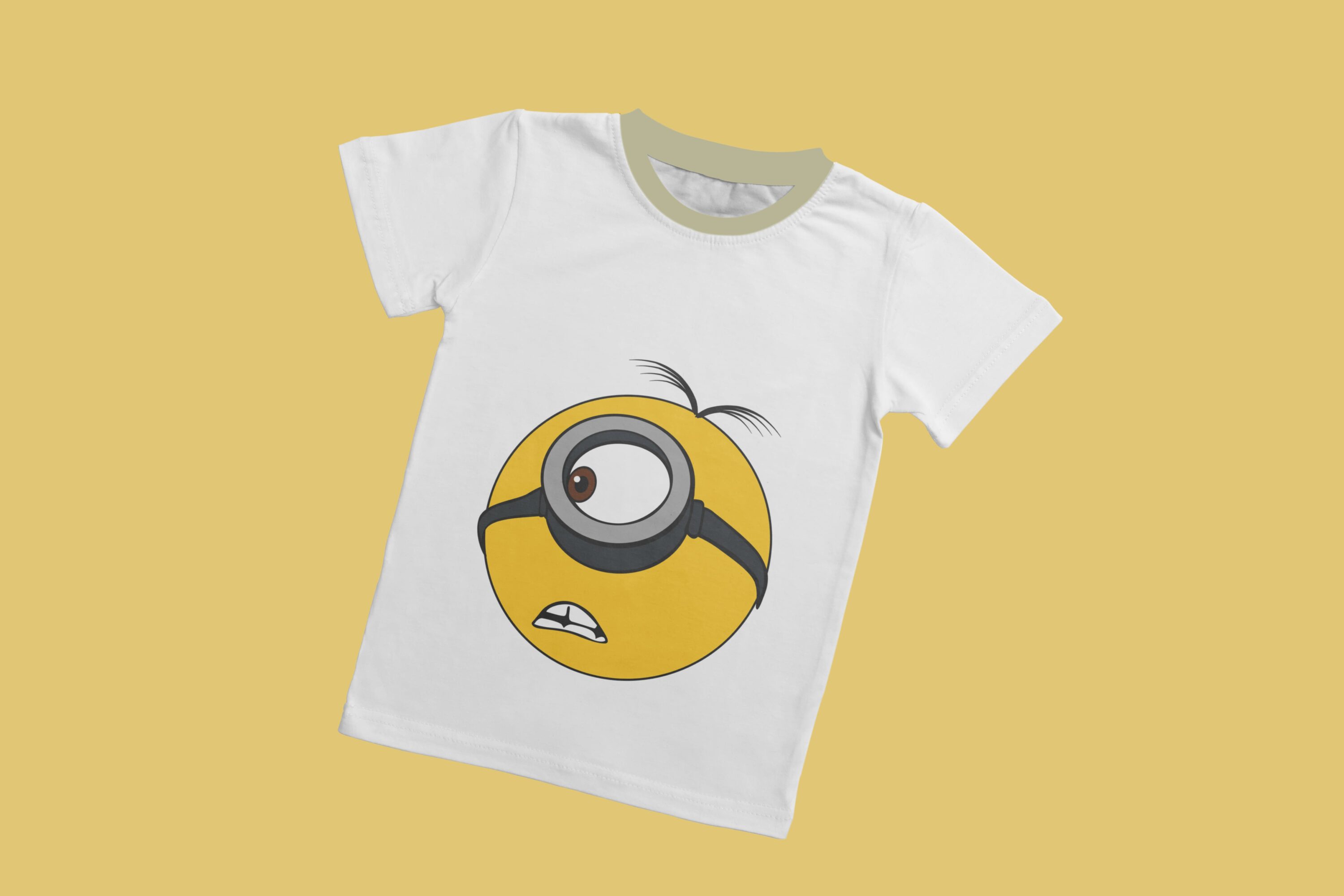 A white T-shirt with a mint collar and a face of a surprised minion.