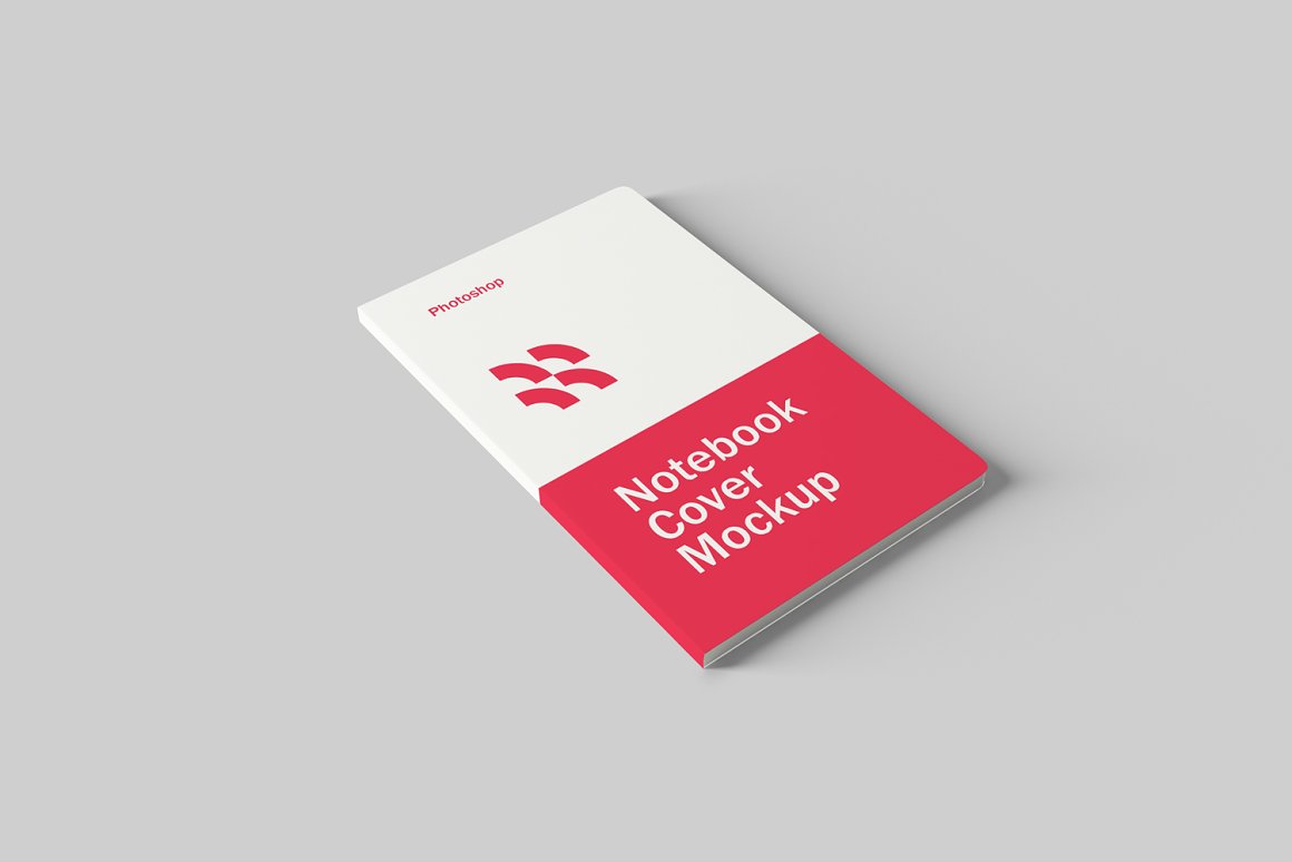 Image of a notebook with a colorful cover in red and white.