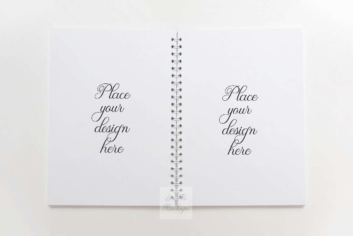 Image of an elegant notebook in an unfolded view with vintage lettering.