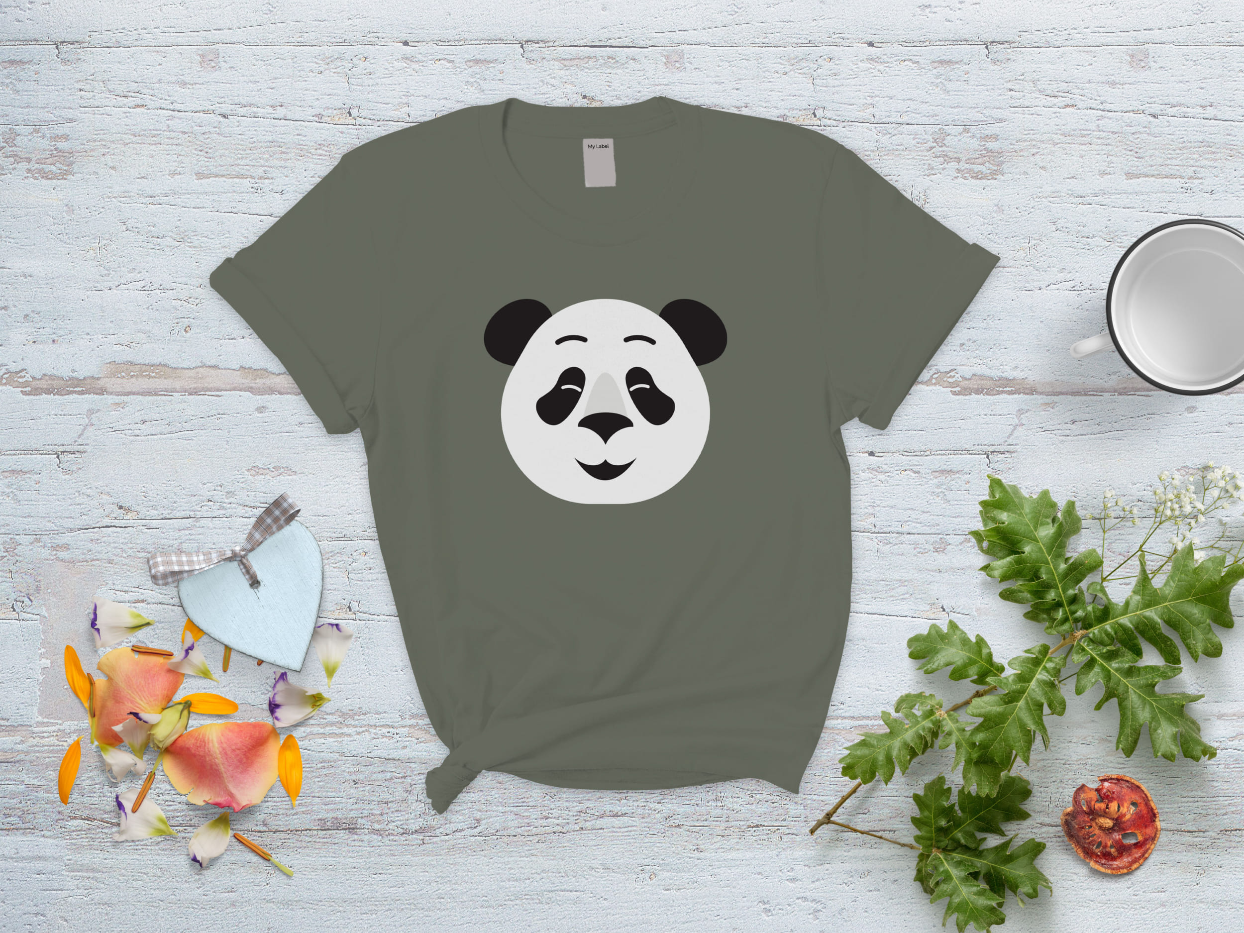 Gray t-shirt with a panda cute face on a gray and white background with various objects.