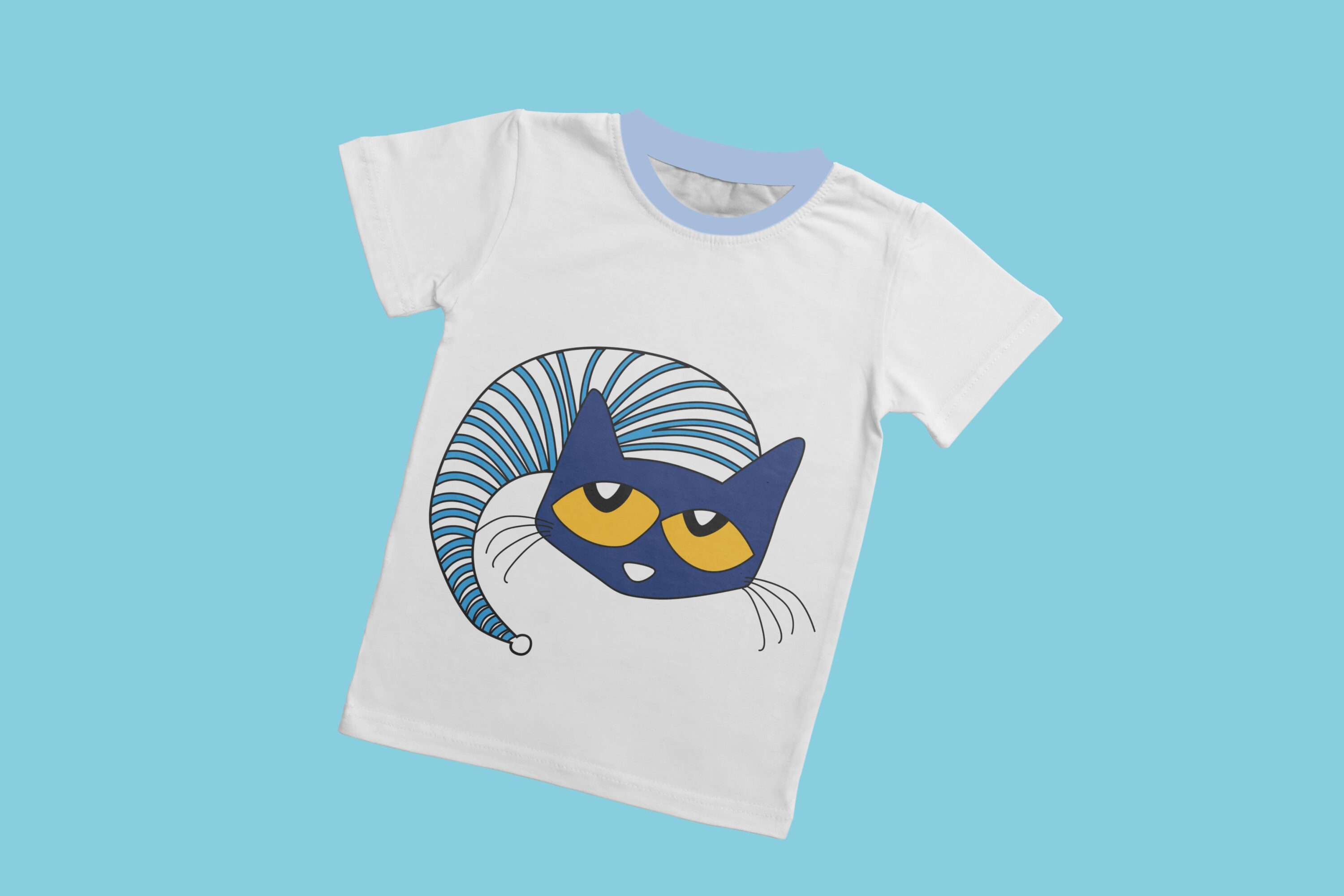 A white t-shirt with a light blue collar and the face of Pete the cat with yellow eyes and a blue and white cap.