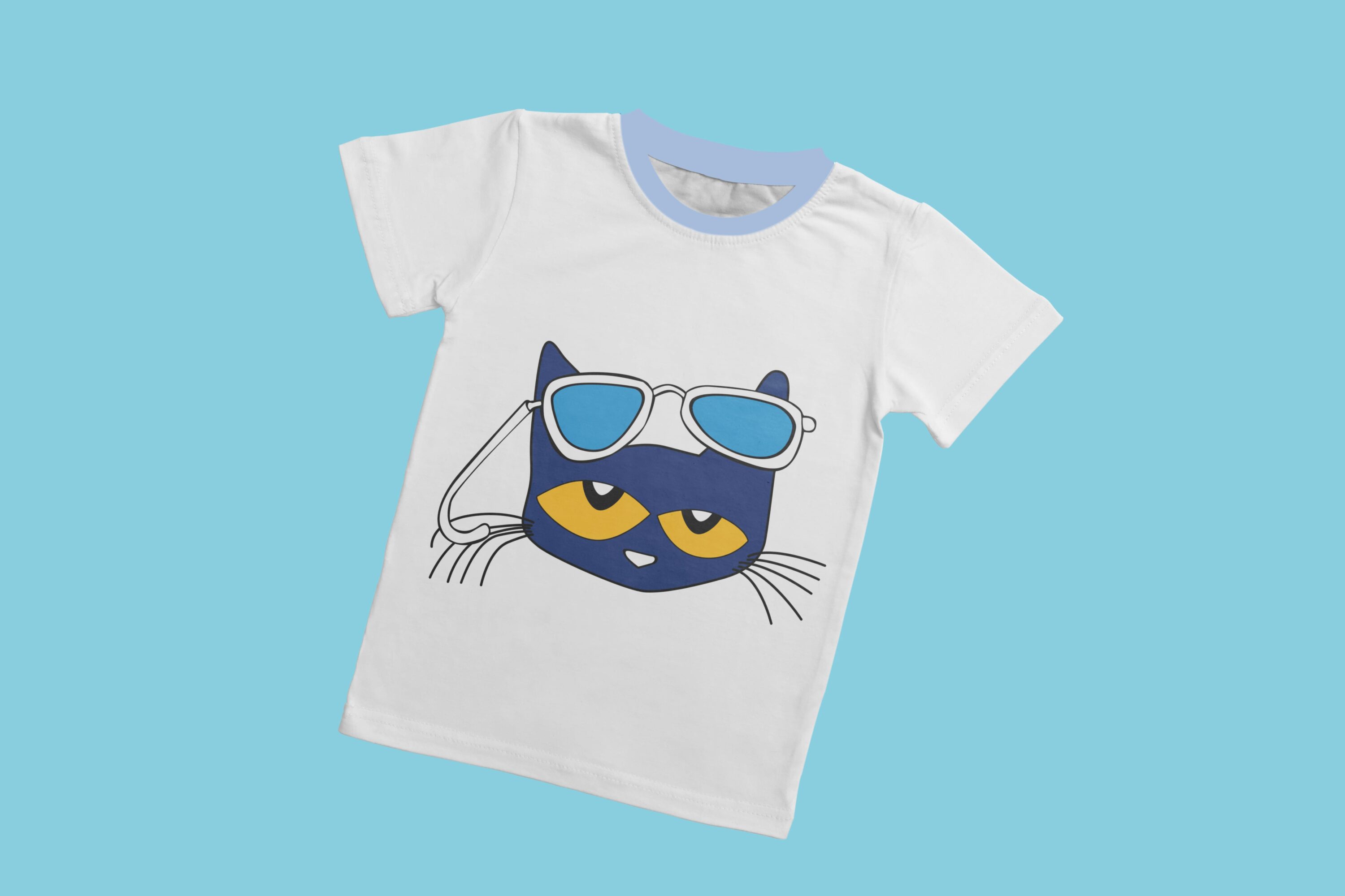 A white t-shirt with a light blue collar and the face of Pete the cat with yellow eyes and glasses.