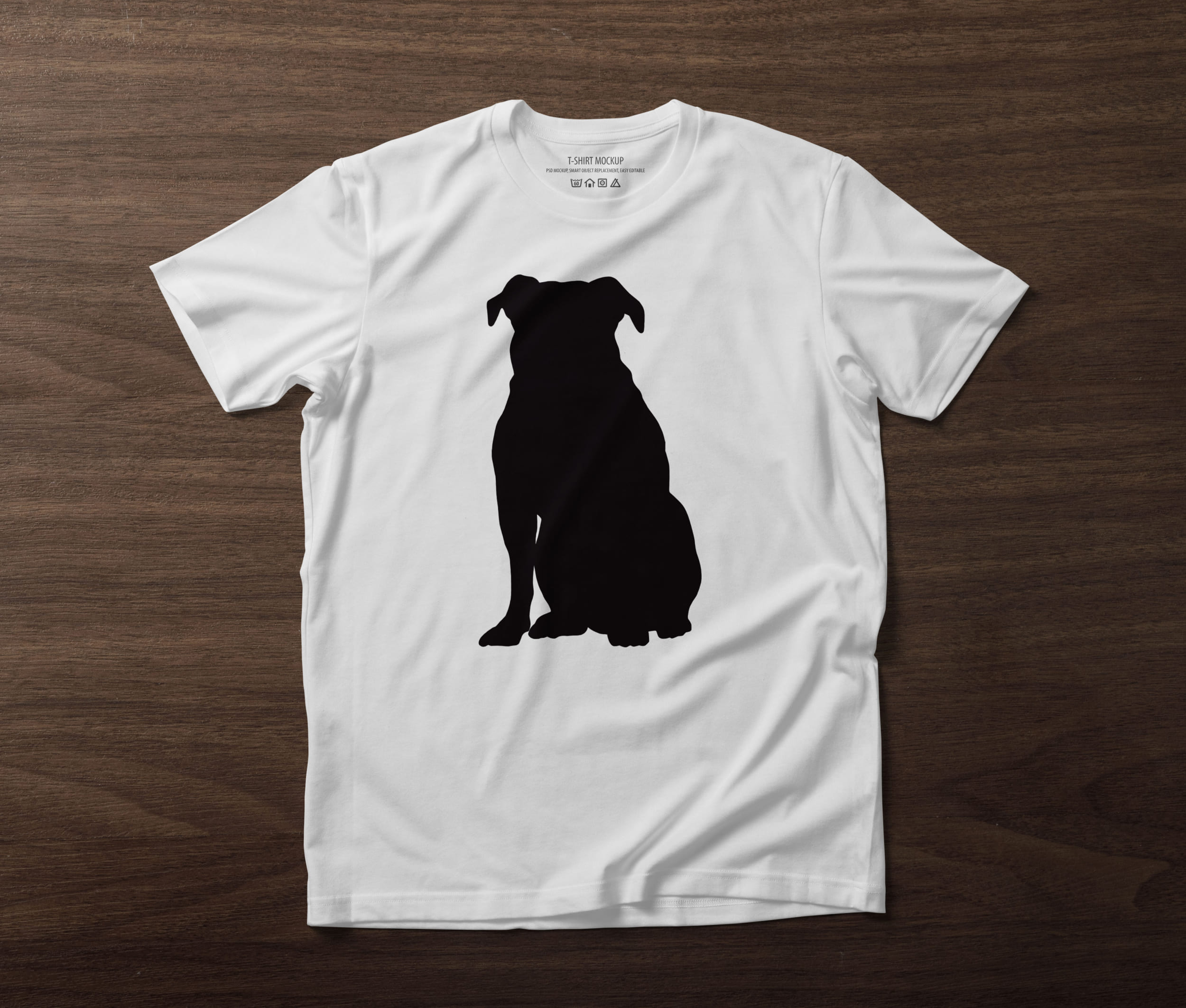 White T-shirt with a black silhouette of a sitting pitbull on the table.