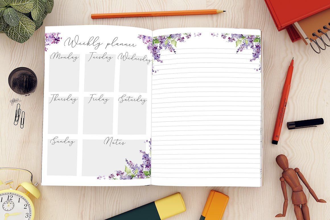 Planner mockup with weekly planner pages and different stationery on the table.