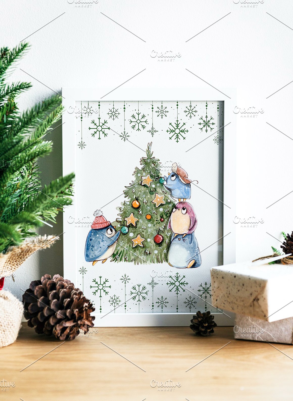 Painting of a Christmas penguins with Xmas tree on a white background in white frame.