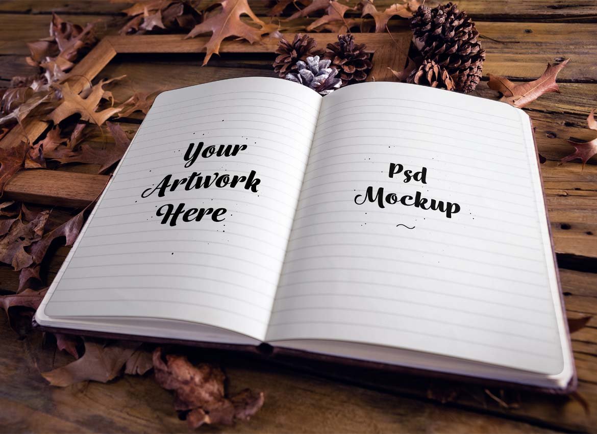 Autumn background with the simple notebook with white pages.