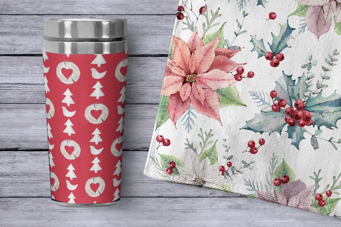 A red thermo cup and textile with a christmas illustrations.