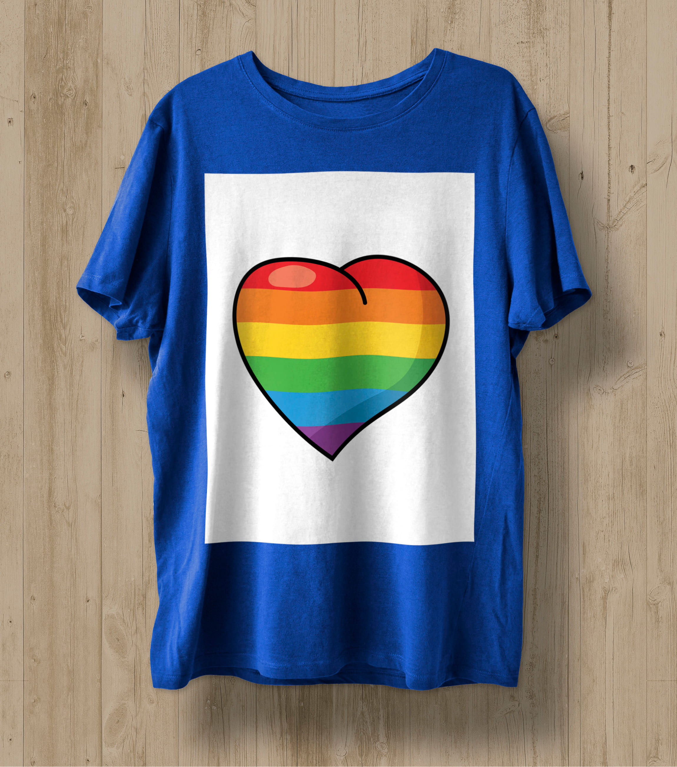 Blue t-shirt with a heart in the colors of the LGBT flag in a white rectangle.