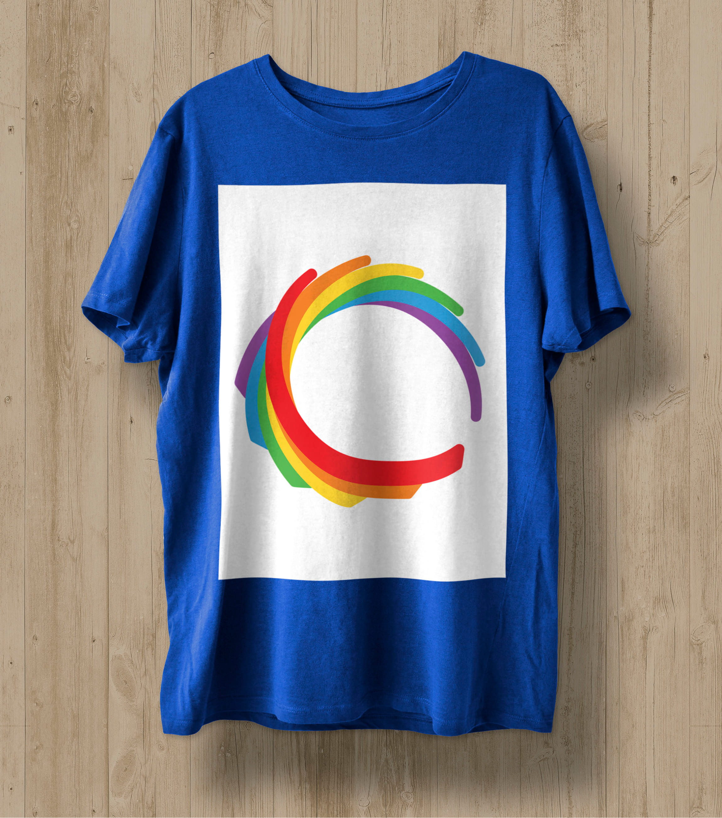 Blue T-shirt with abstractions in the colors of the LGBT flag in a white rectangle.