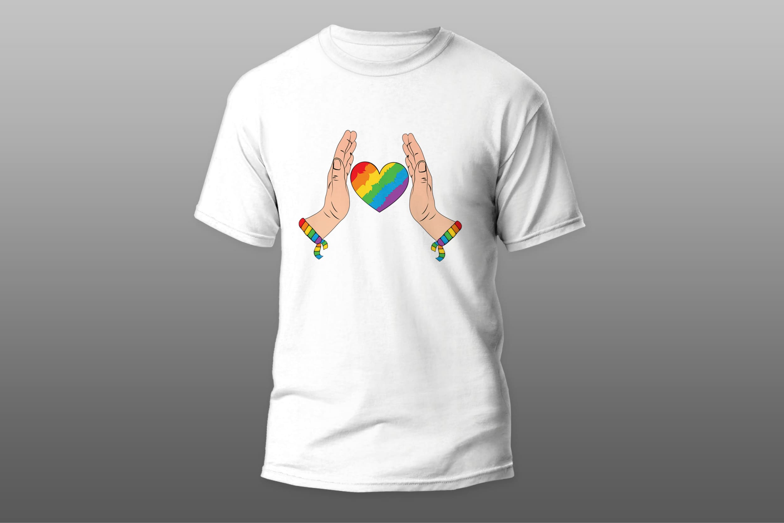 White T-shirt with the image of hands holding a heart in the colors of the LGBT flag on a gray background.