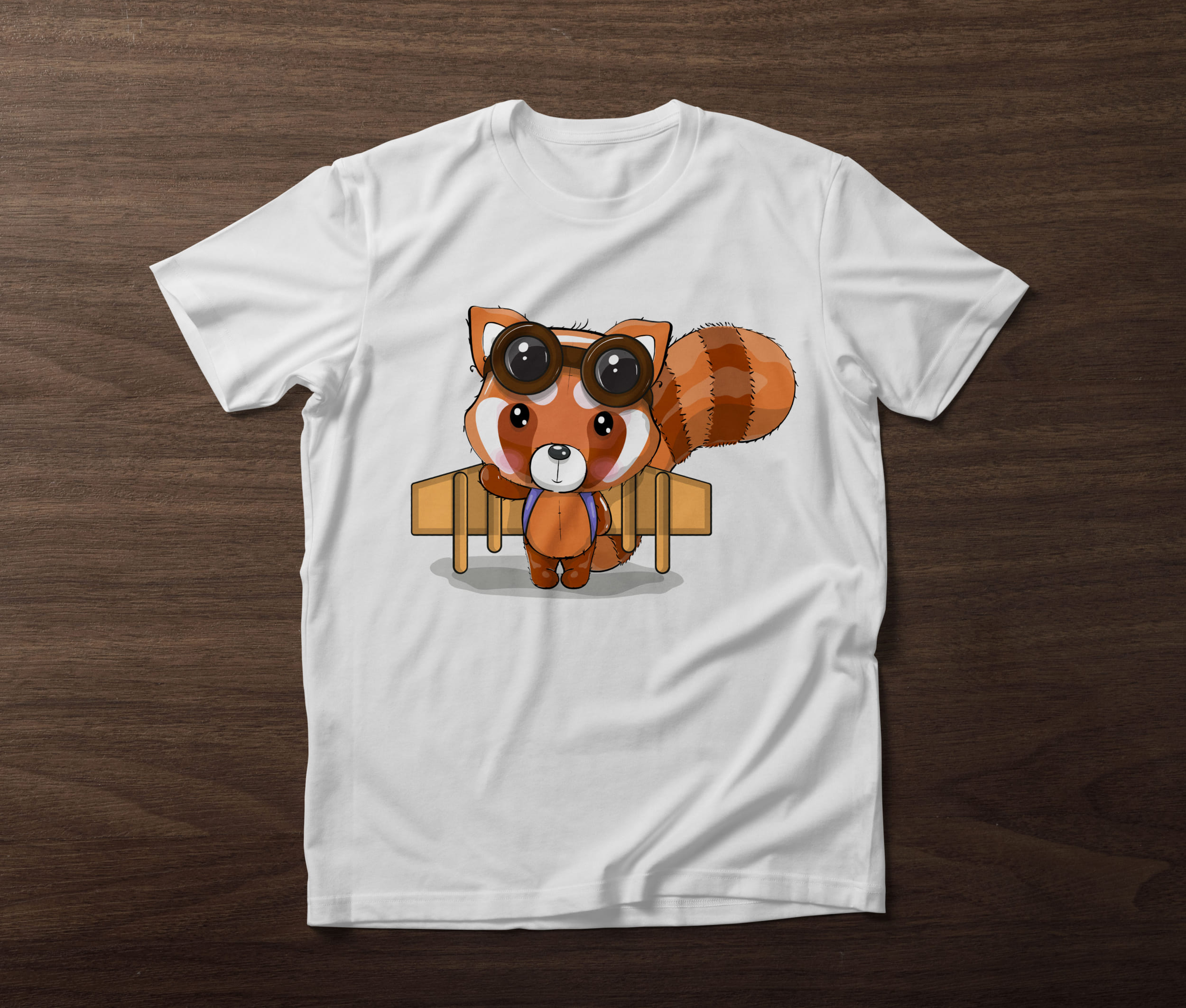 White t-shirt with a red panda traveler on a wooden background.