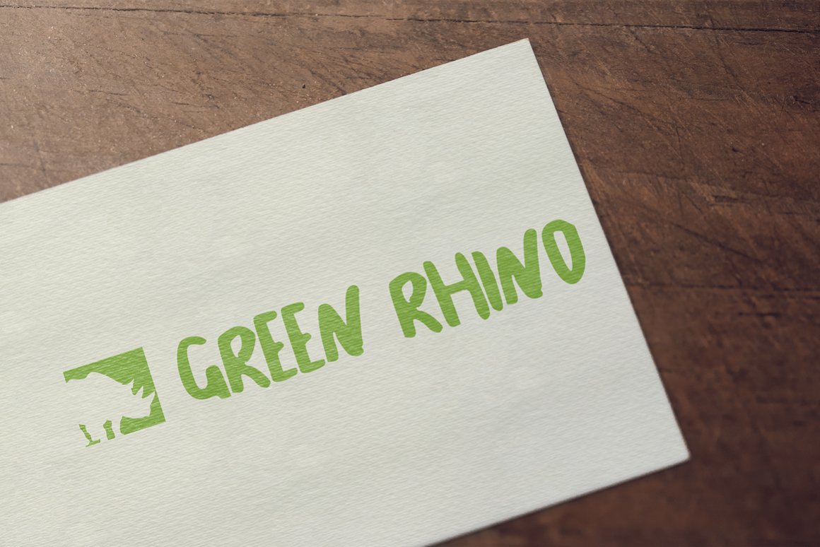 Ivory piece of paper with the matte green lettering.