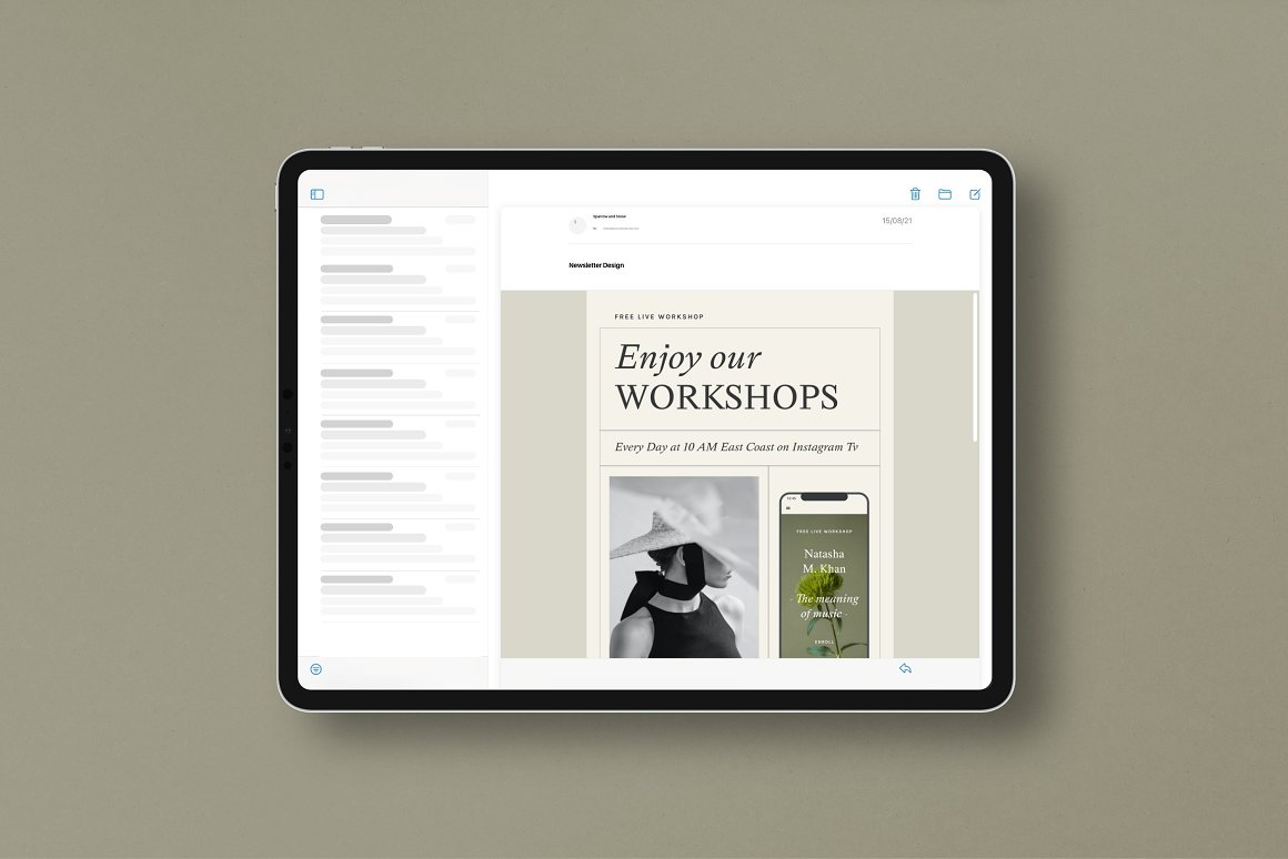 Black mockup Ipad with newsletter template on a gray background.