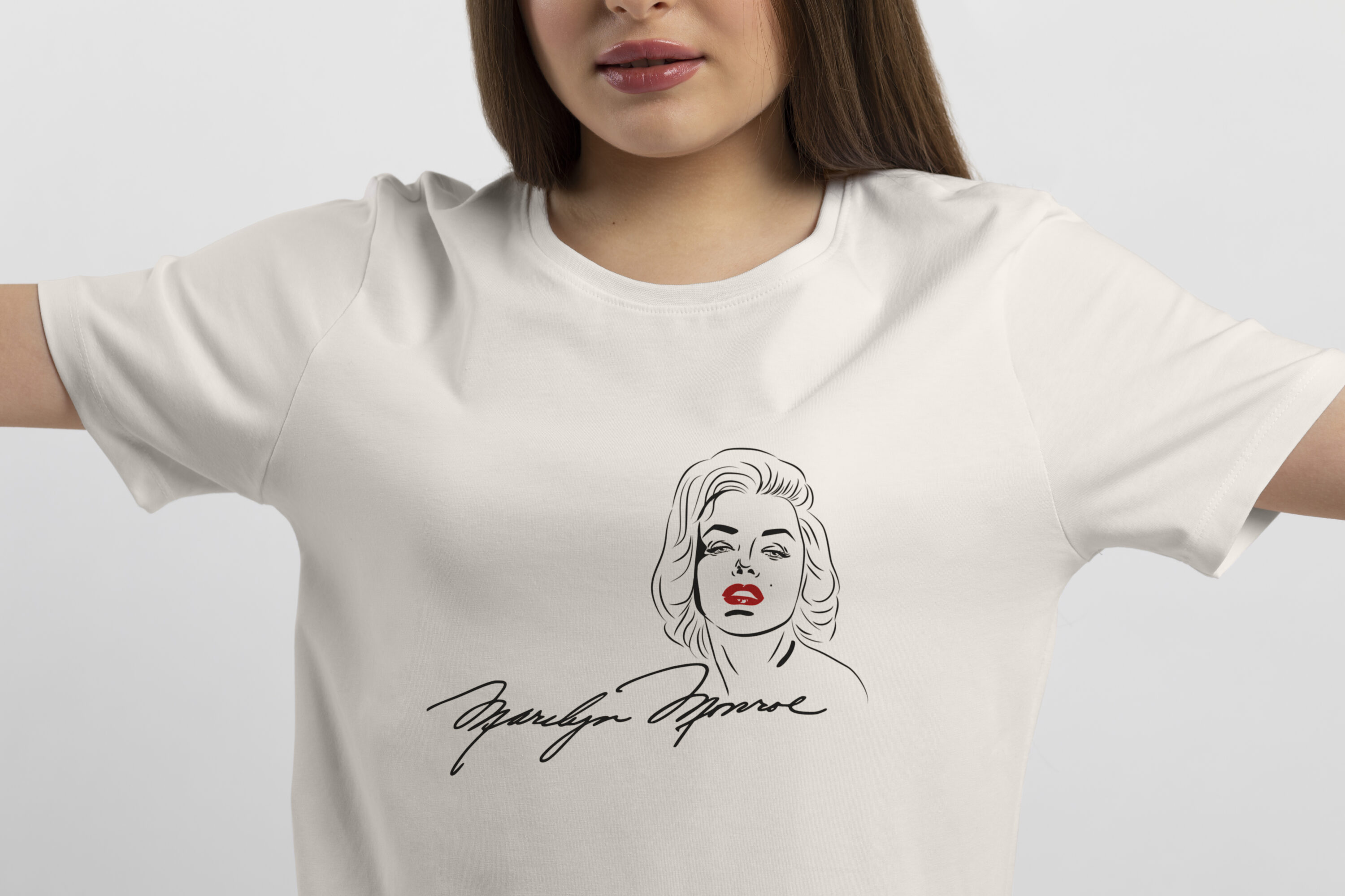 Picture of a white t-shirt with an exquisite print of Marilyn Monroe's signature.