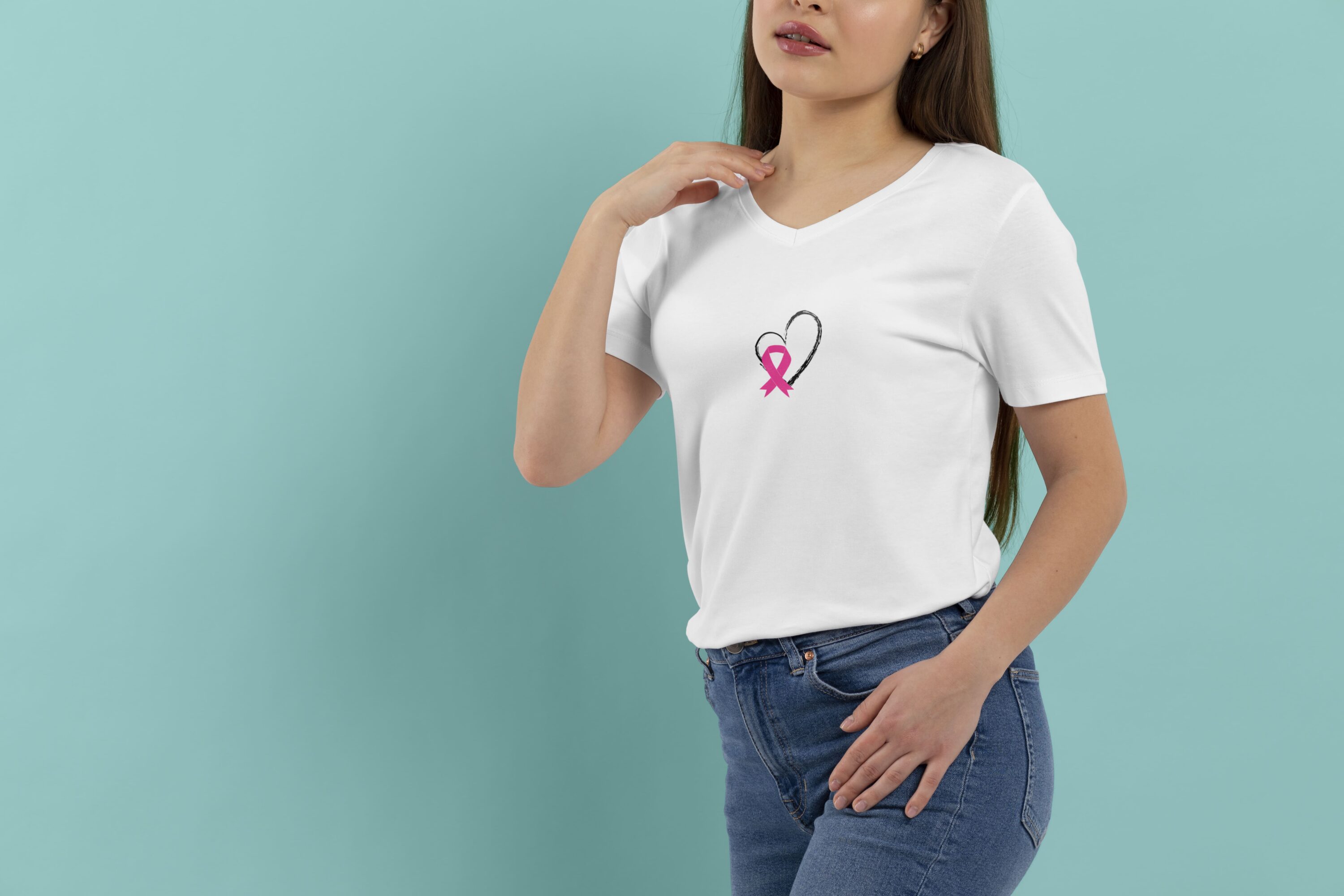 Simple white t-shirt with the pink breast cancer ribbon in a heart.