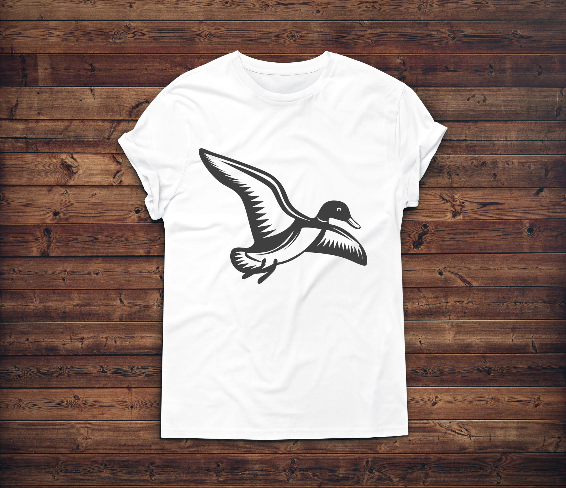 Picture of a white t-shirt with an adorable duck silhouette print.