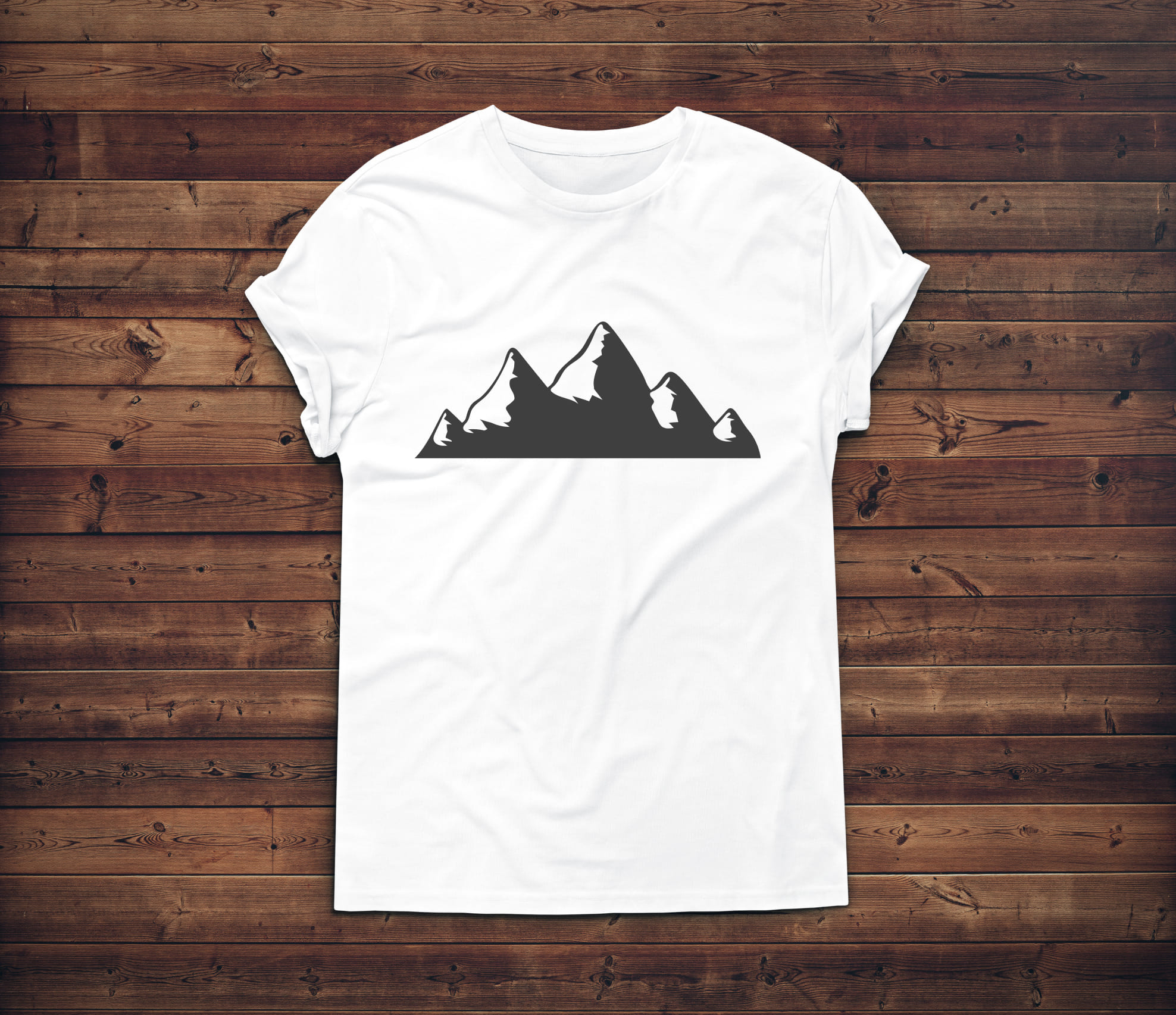 Image of a white t-shirt with a beautiful print of the silhouette of the mountains.